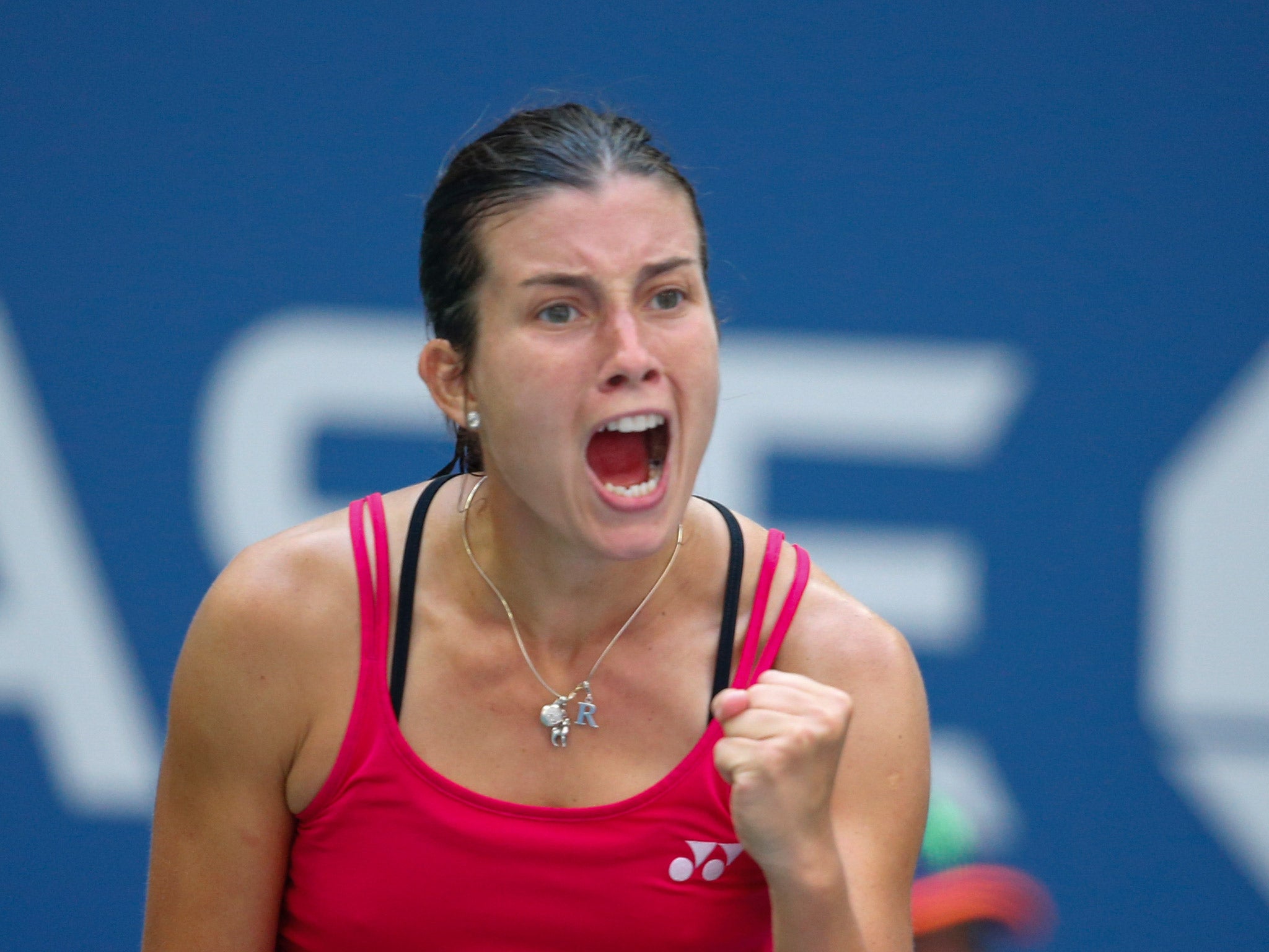 Anastasija Sevastova celebrates her victory over Johanna Konta n the US Open fourth round