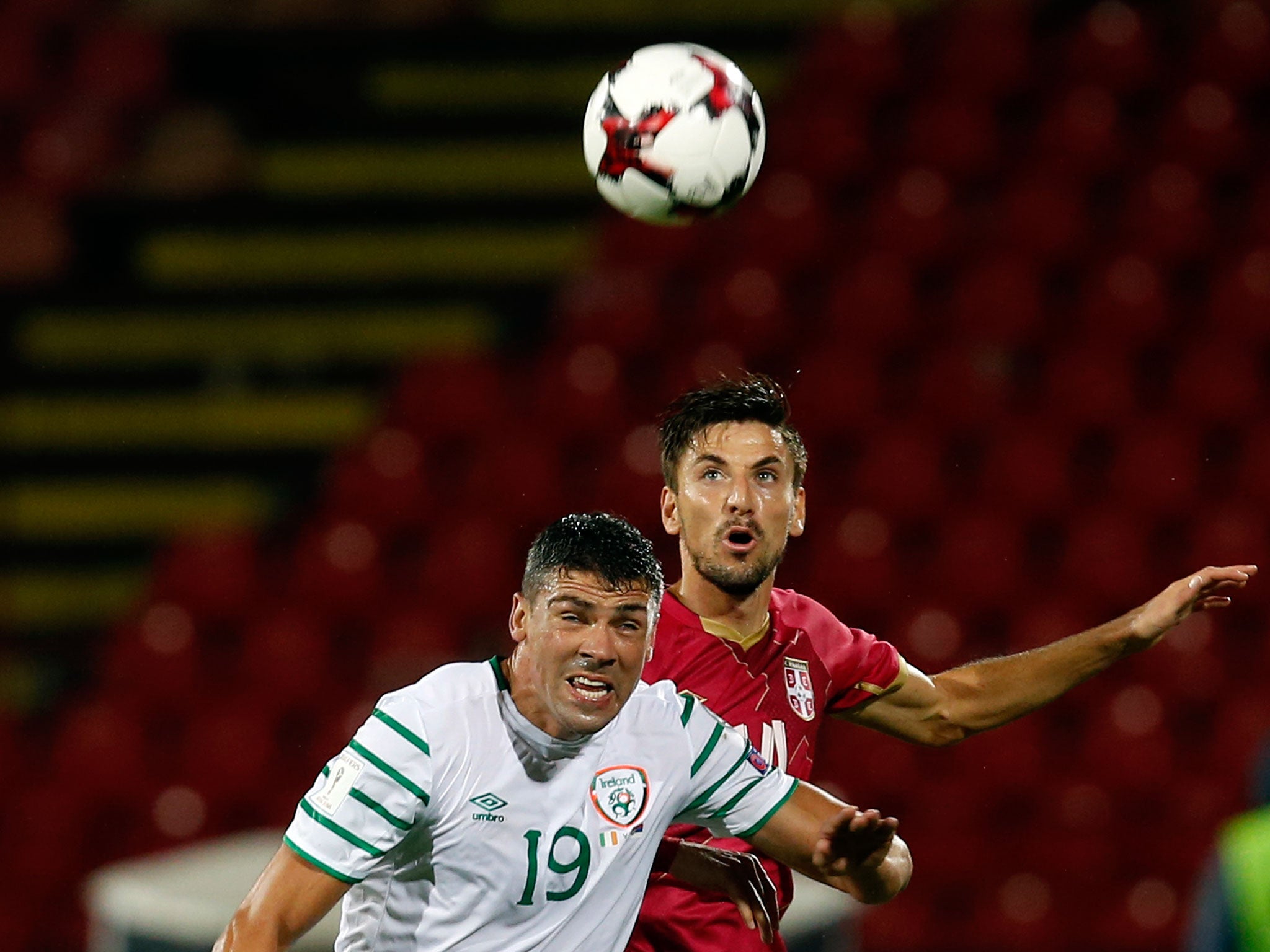 Serbia's Filip Mladenovic, right, challenges Ireland's Jon Walters, during their World Cup Group D qualifying match at the Rajko Mitic Stadium in Belgrade, Serbia, Monday, Sept. 5, 2016.