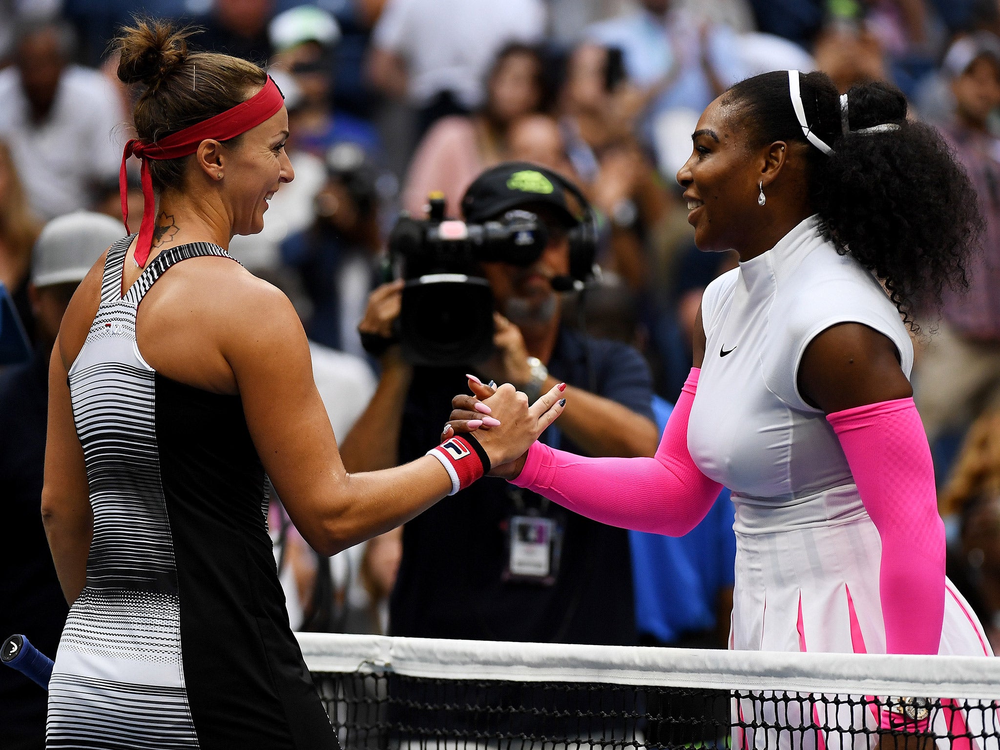 Williams and Shvedova shake hands after their fourth round encounter