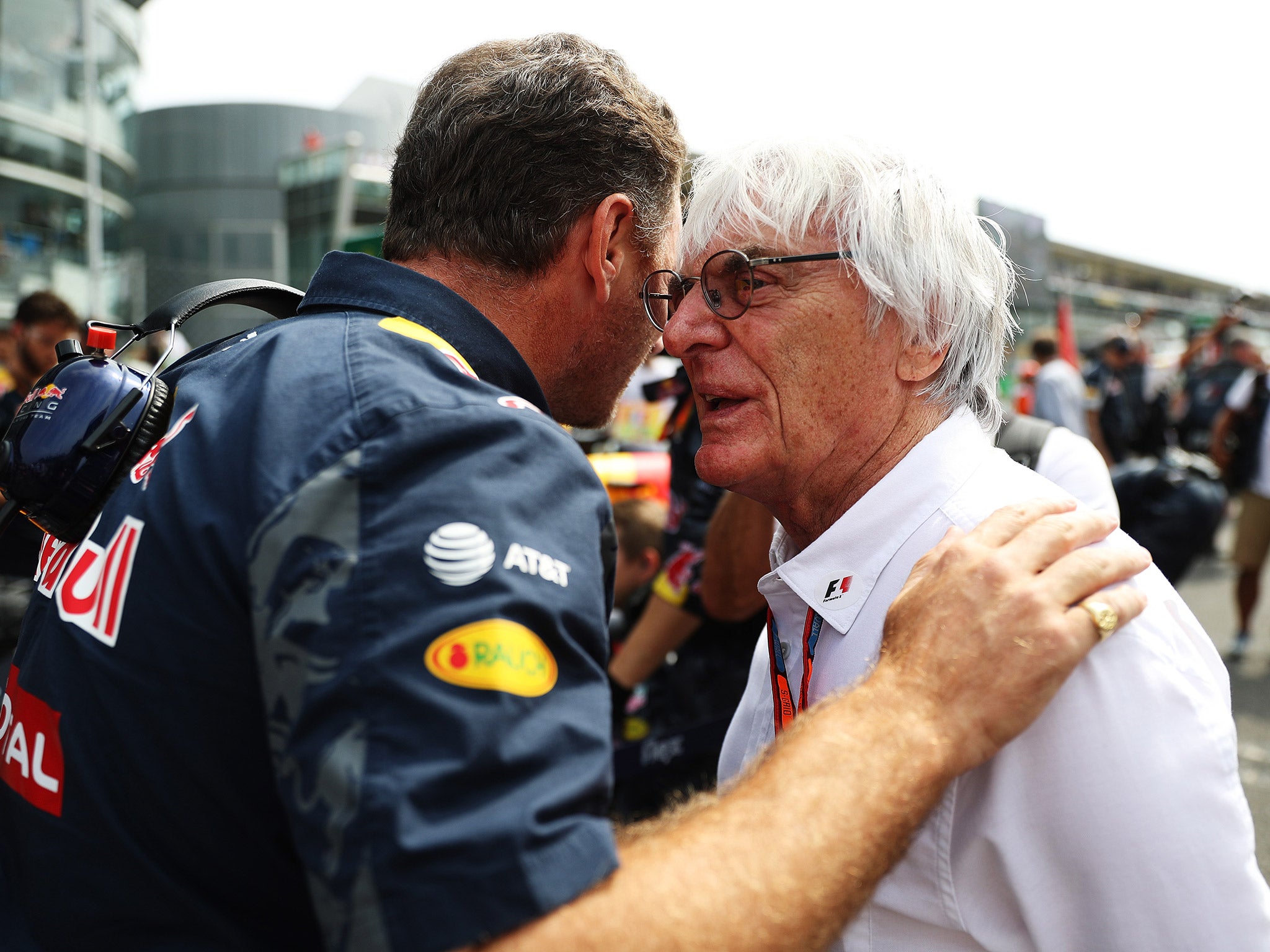 Red Bull chief Christian Horner speaks with Ecclestone in Monza last weekend