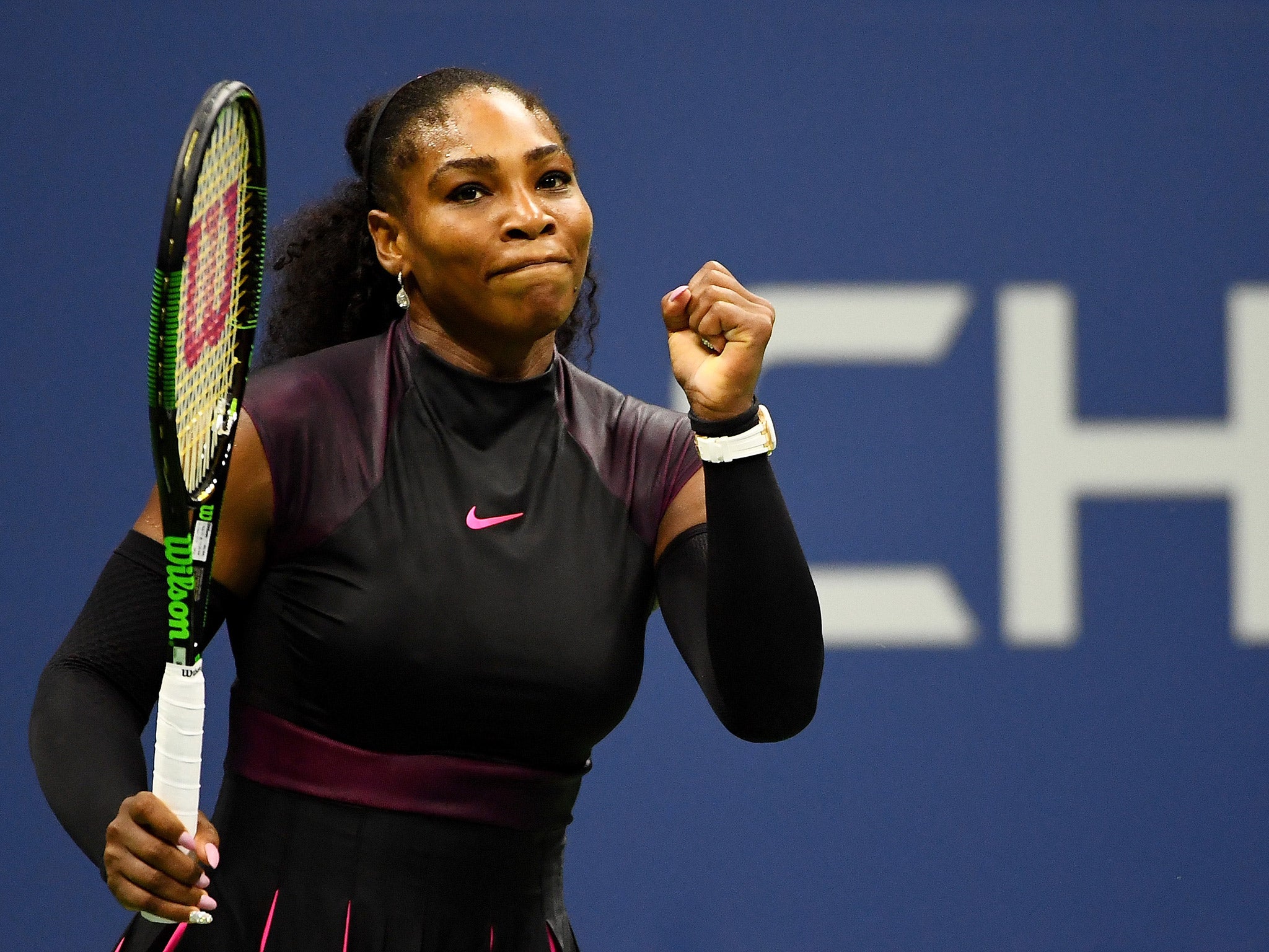 Williams celebrates her victory over Halep in the quarter-finals