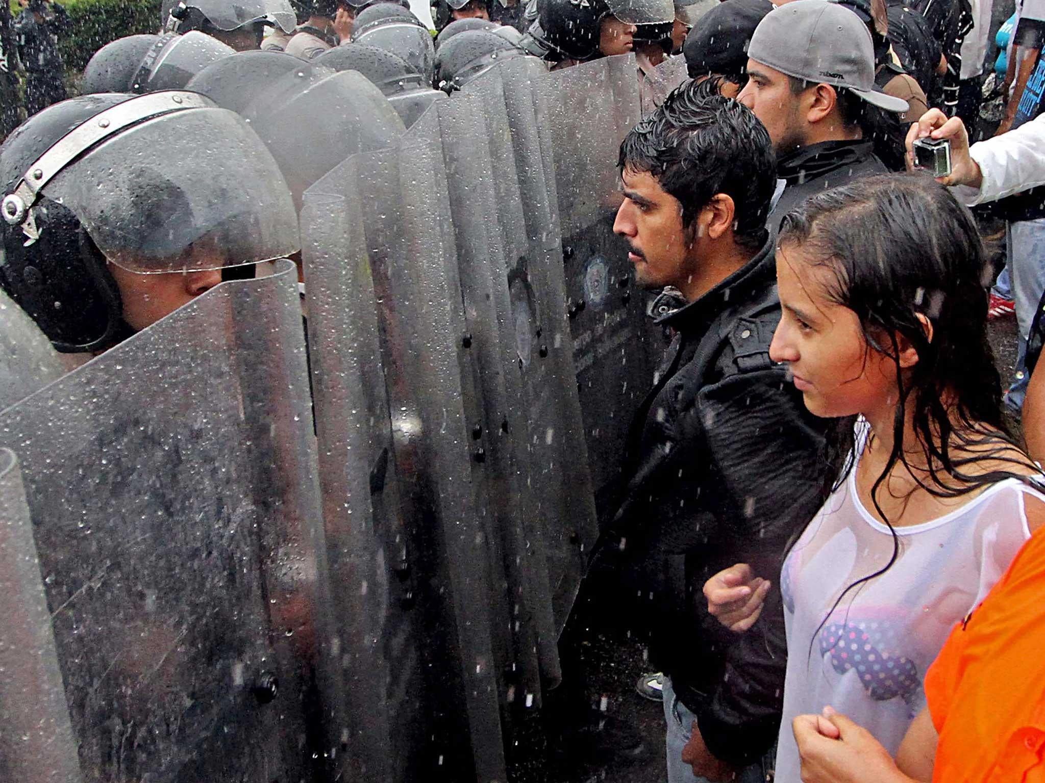 Hundreds of university students took to the streets of Caracas on Friday to protest President Nicolas Maduro’s ‘absolute authoritarianism’