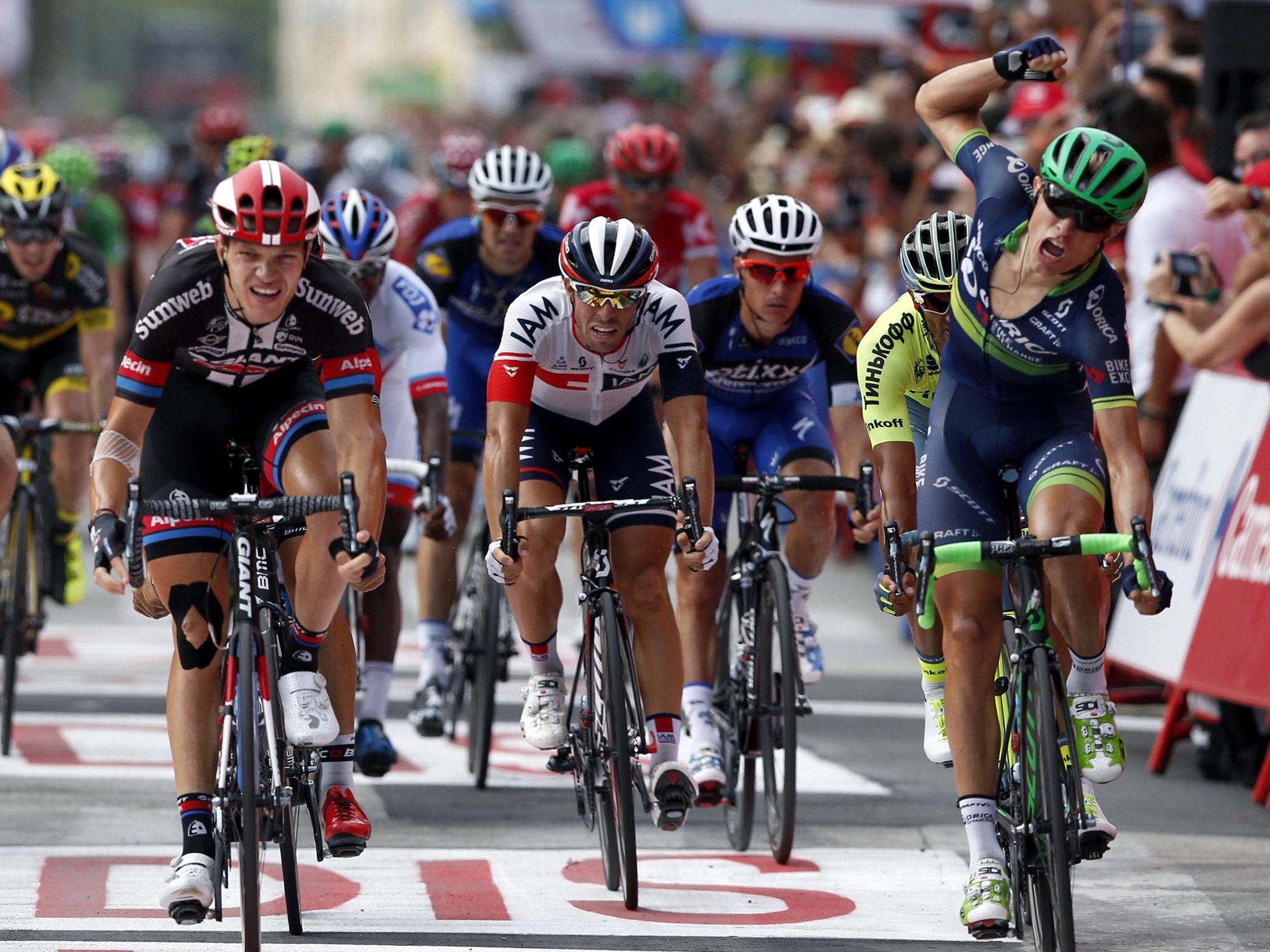 Denmark’s Magnus Cort Nielsen (right) celebrates winning the 18th stage of the Vuelta a Espana