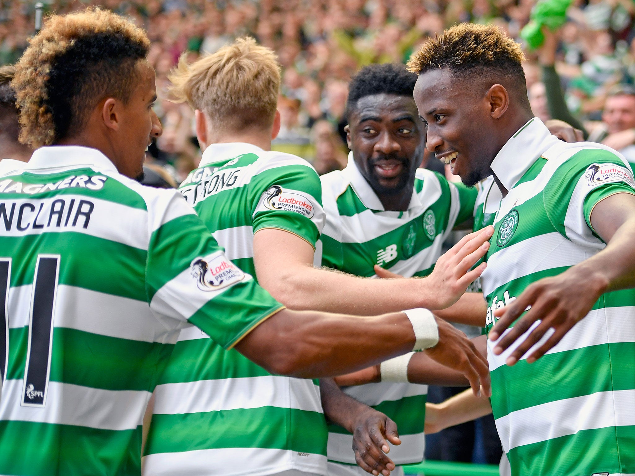 Celtic players congratulate Dembele on his hat-trick