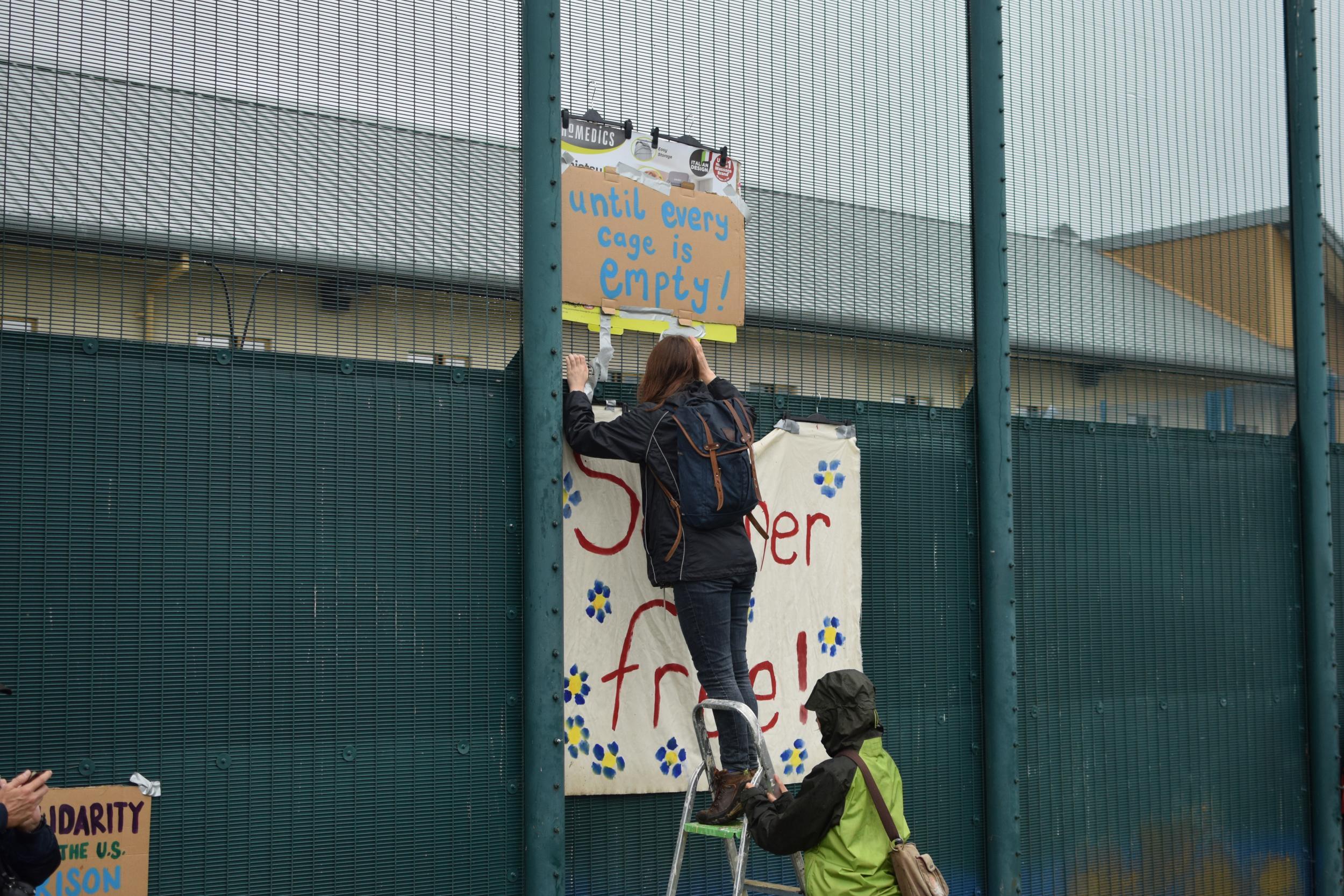 Activists threw flowers over the fences into the facility