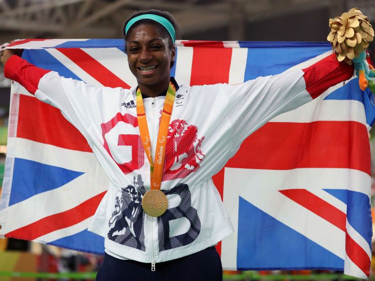 Great Britain's Kadeena Cox celebrates with her Gold medal won in the Women's C4-5 500m Time Trial final at the Olympic Veleodrome during the third day of the 2016 Rio Paralympic Games in Rio de Janeiro