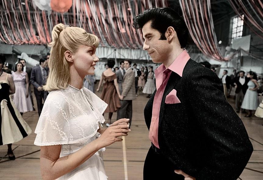 John Travolta addresses online fan theory about 'Grease'.