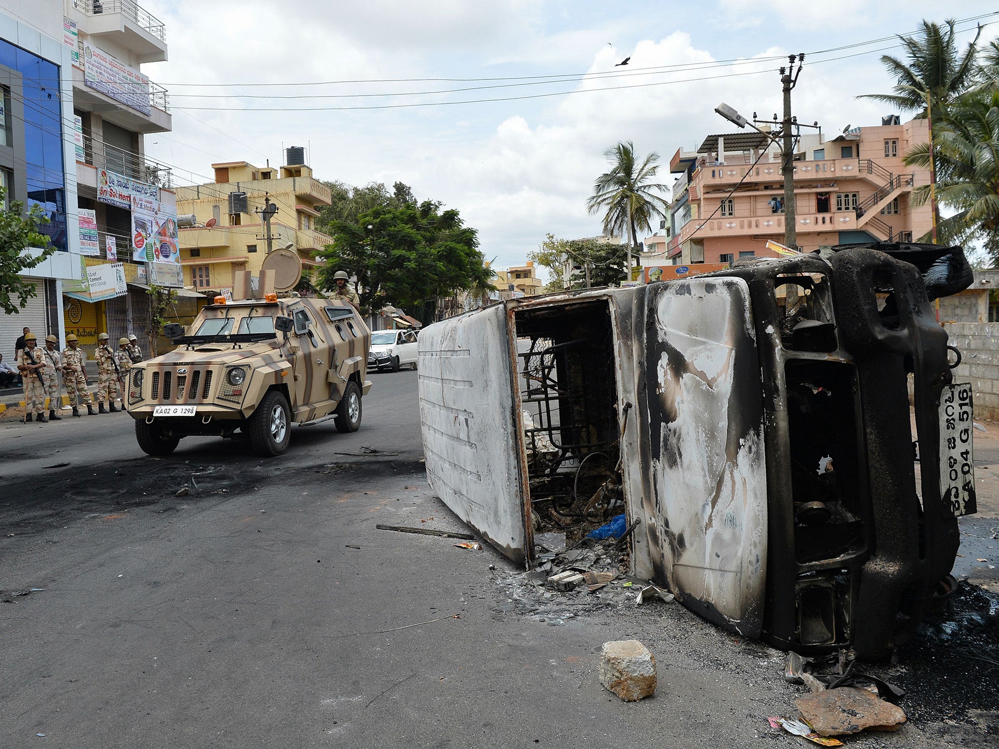 A water sharing dispute saw dozens of buses and cars set on fire by protesters (AFP/Getty)