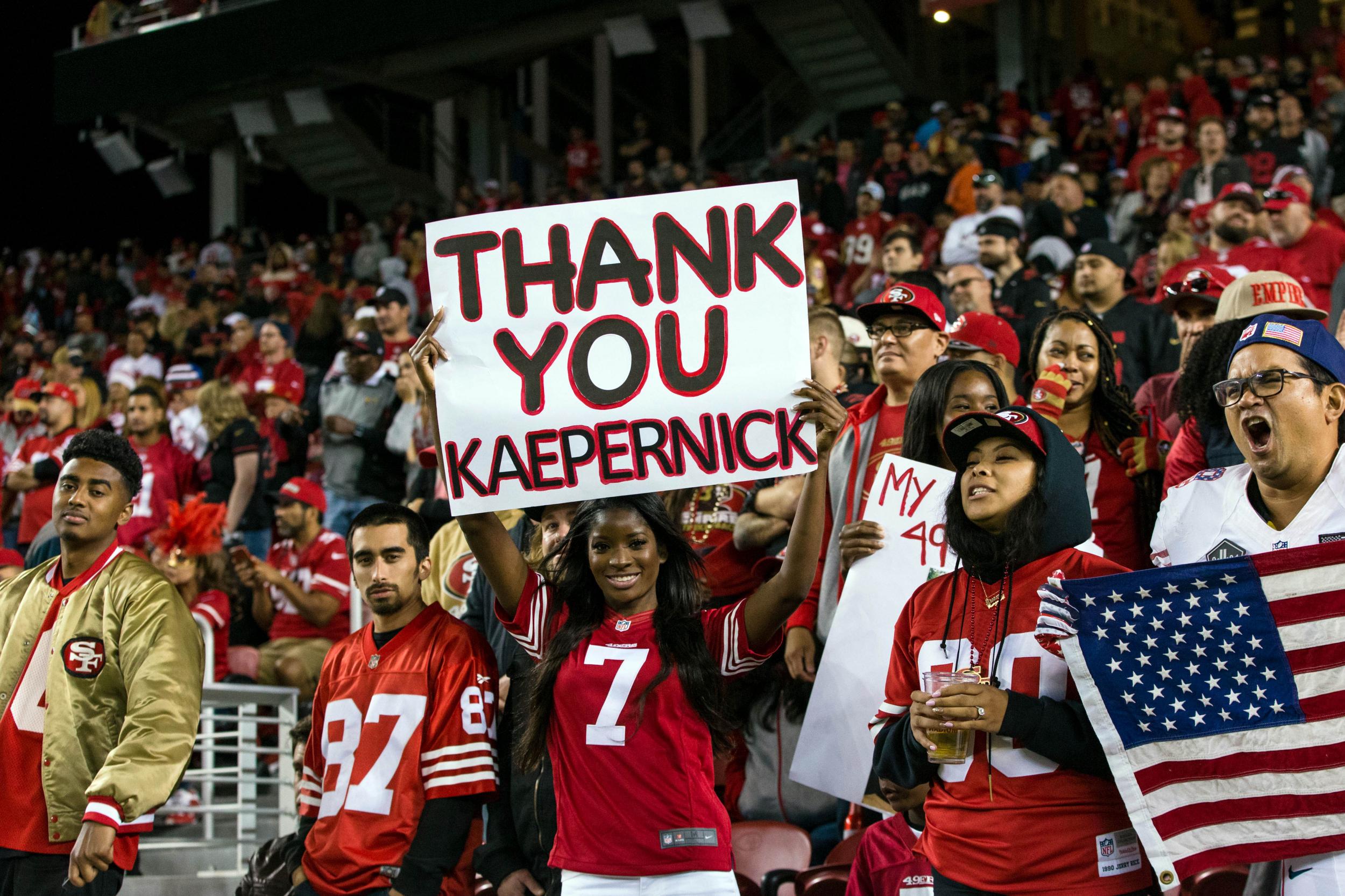 A San Francisco 49ers fan holds a sign after the game against the Los Angeles Rams at Levi's Stadium