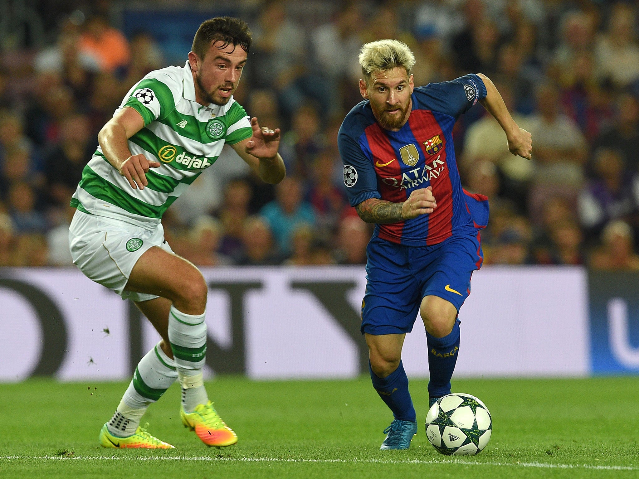 Lionel Messi bypasses Celtic's Eoghan O'Connell at the Nou Camp