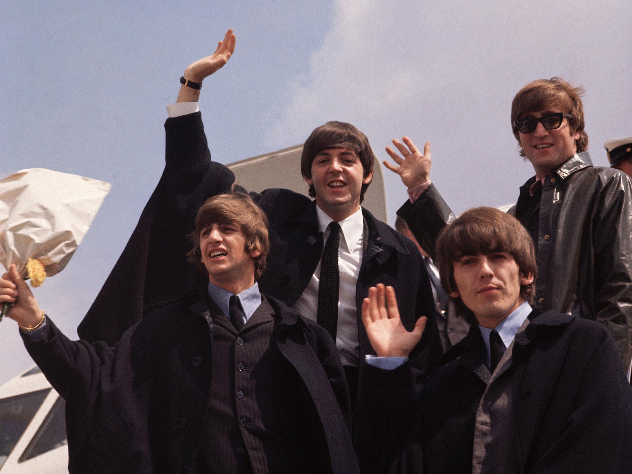 The Beatles arrive back in London in July 1964 after following a tour of Australia