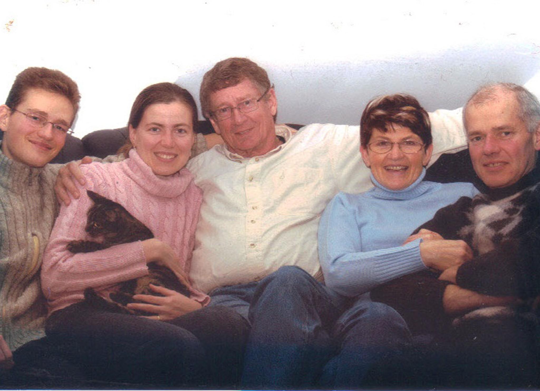 Andre and Karina with her brother (left) and her parents (right)