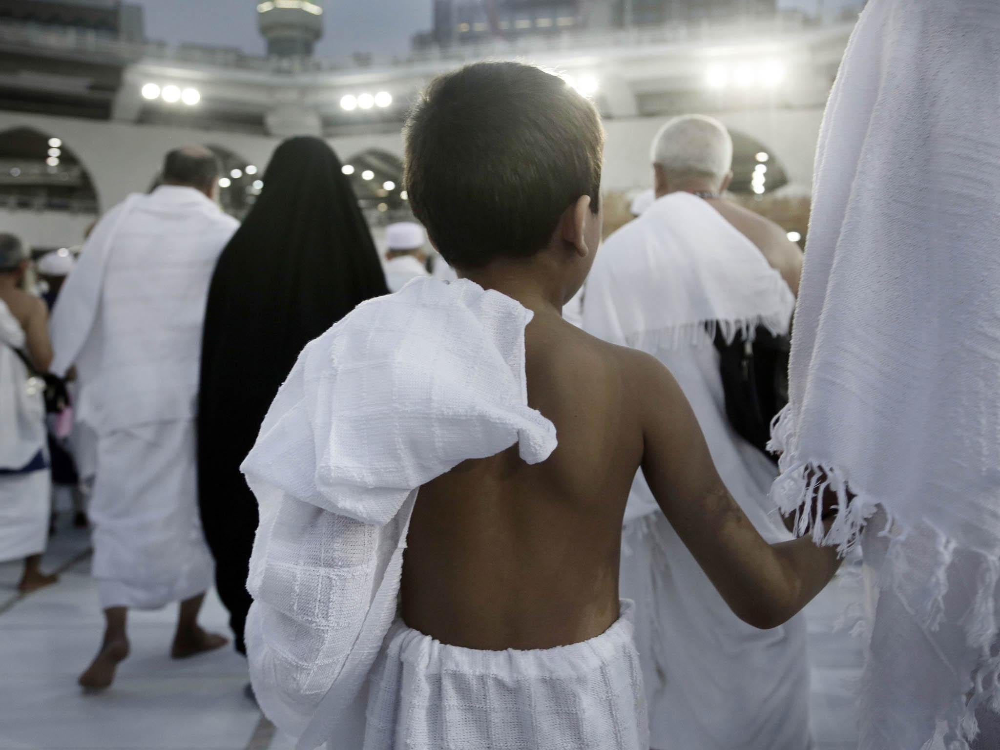 Muslims circle the Kaaba, Islam's holiest shrine, at the Grand Mosque in the Muslim holy city of Mecca, Saudi Arabia