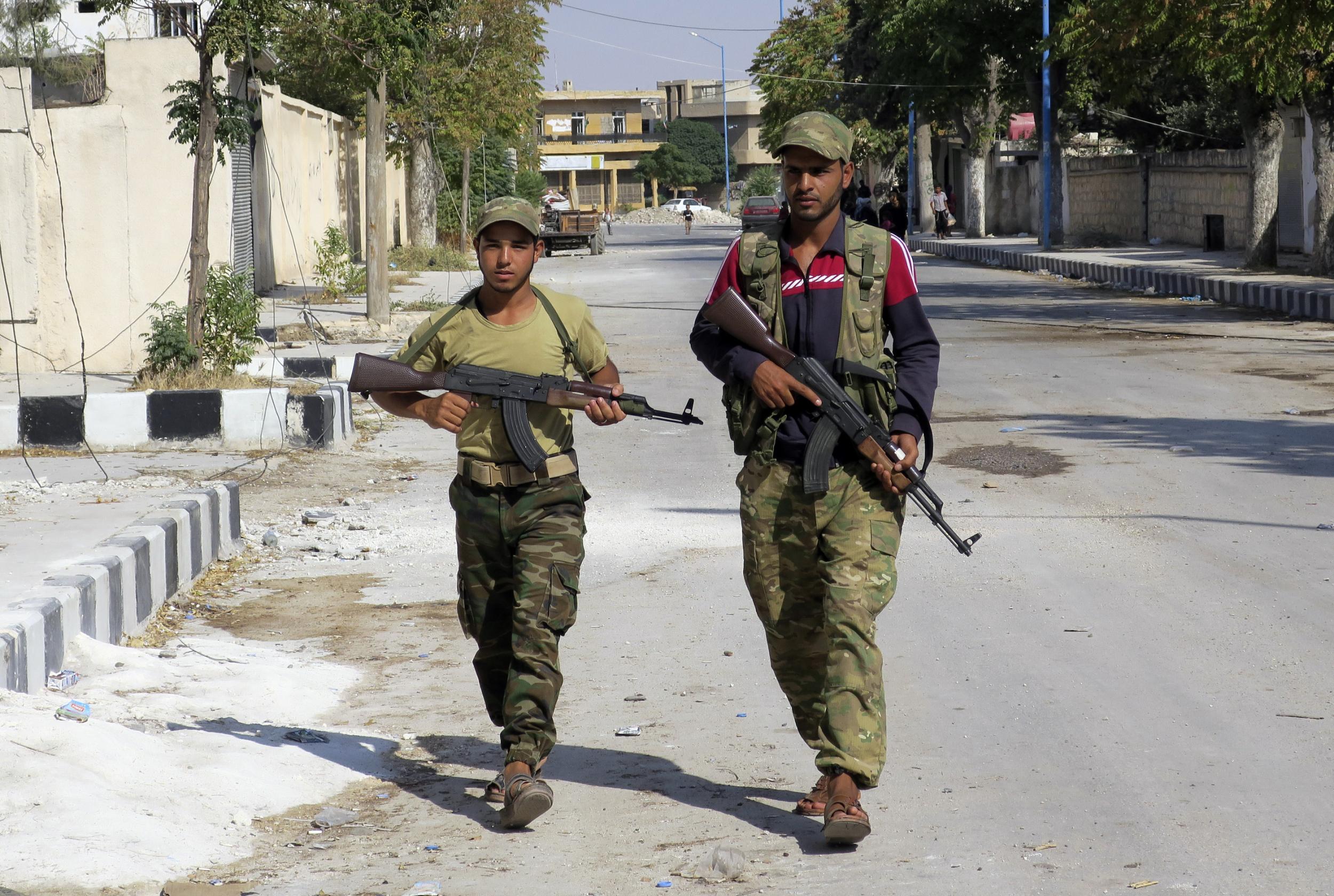 Free Syrian Army fighters on patrol in Jarablus