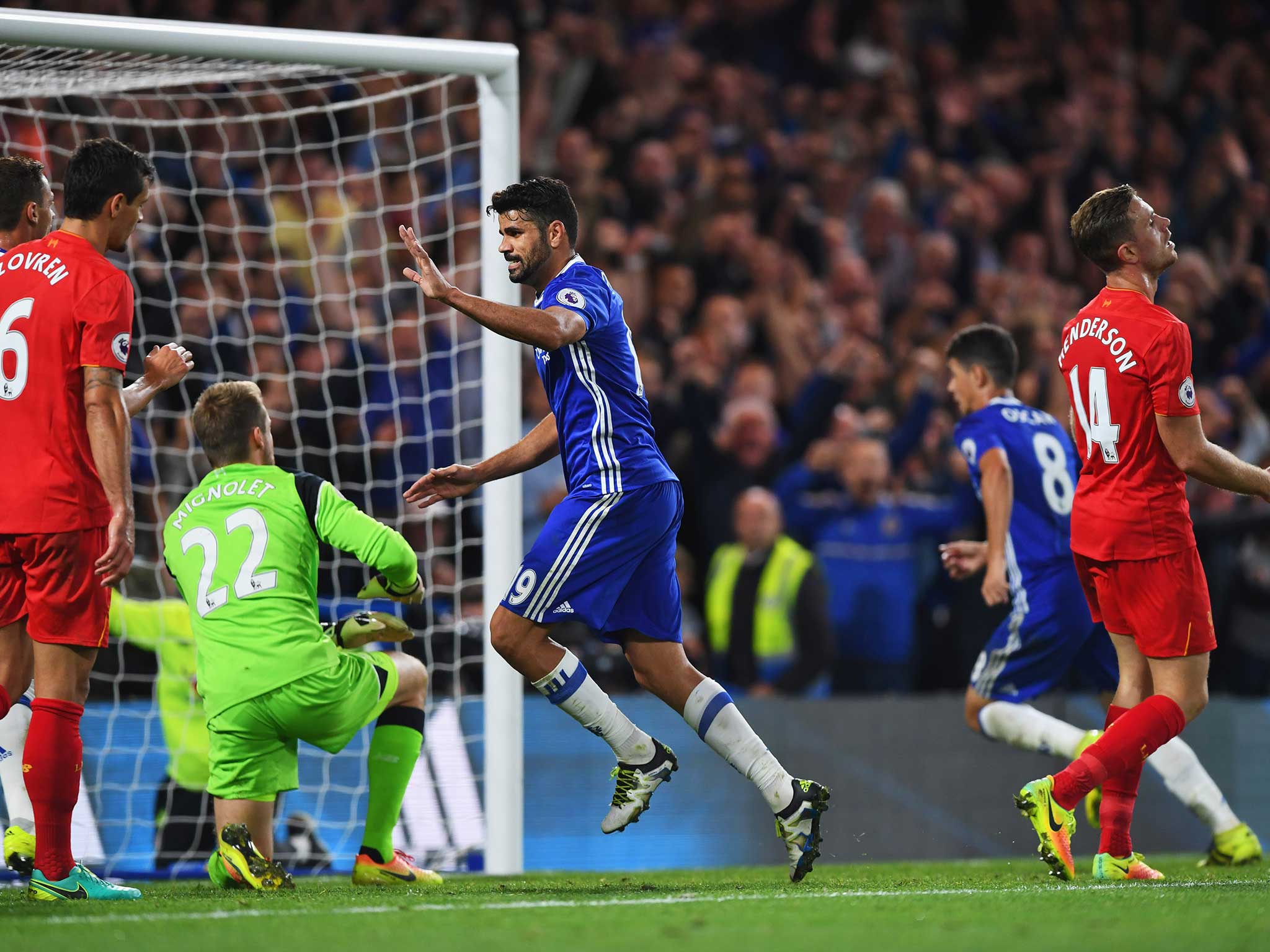 Diego Costa celebrates pulling one back for Chelsea