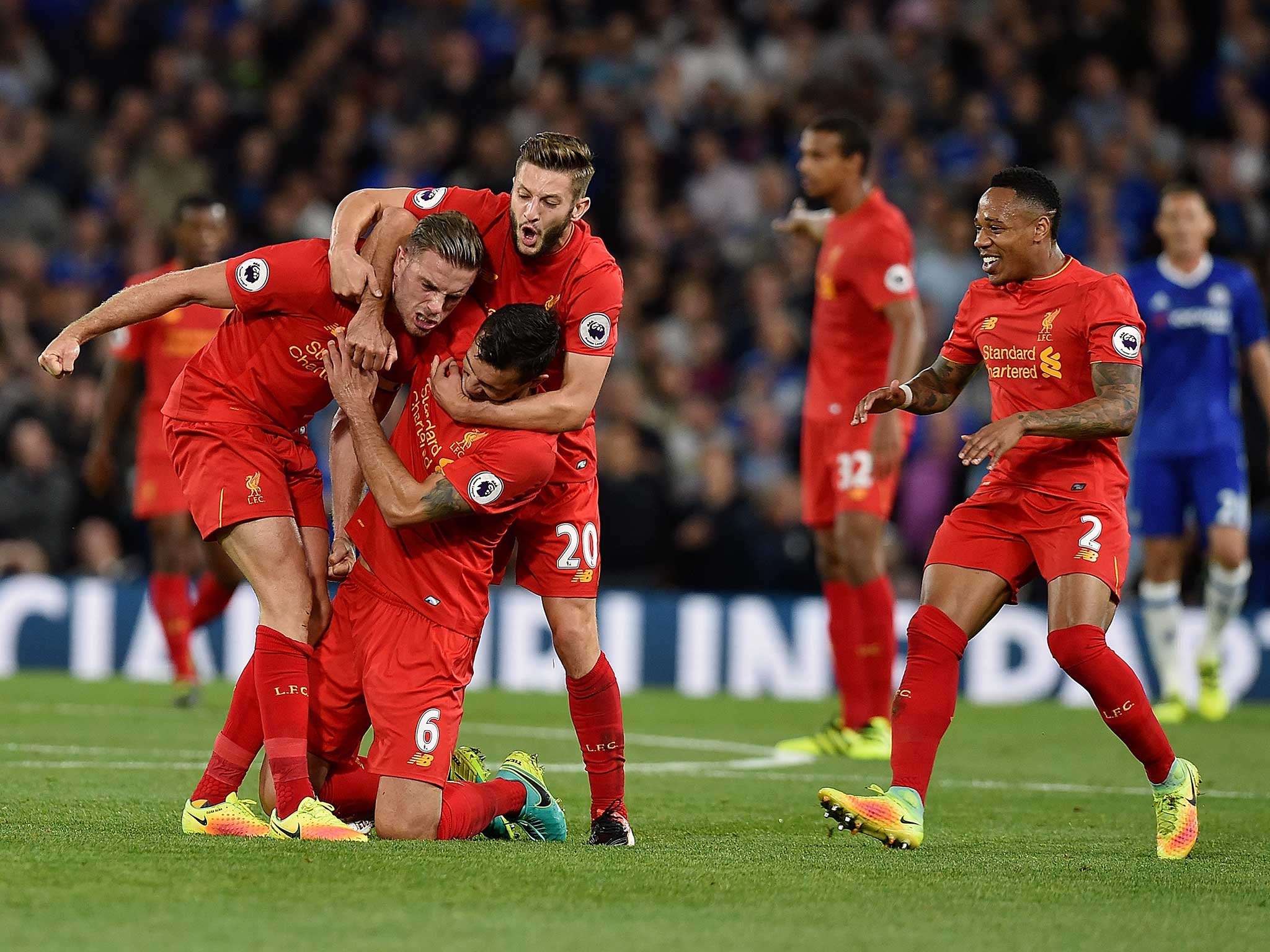 Jordan Henderson is congratulated by his team-mates