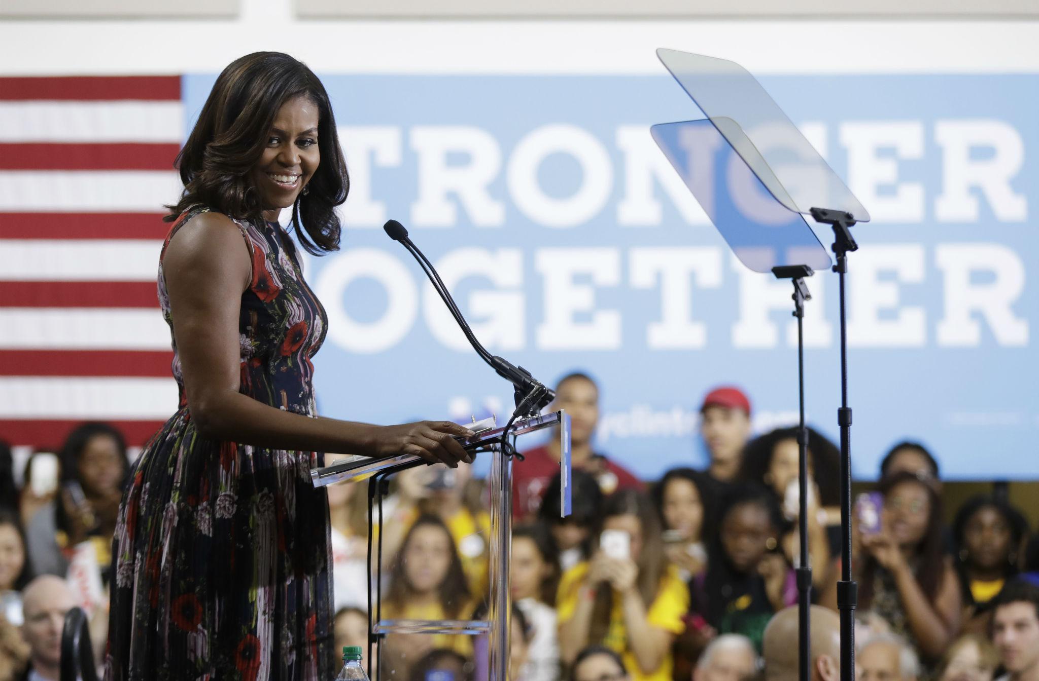 Ms Obama held up her hand and said: 'Let me take a moment' as she recalled eight years' worth of questioning