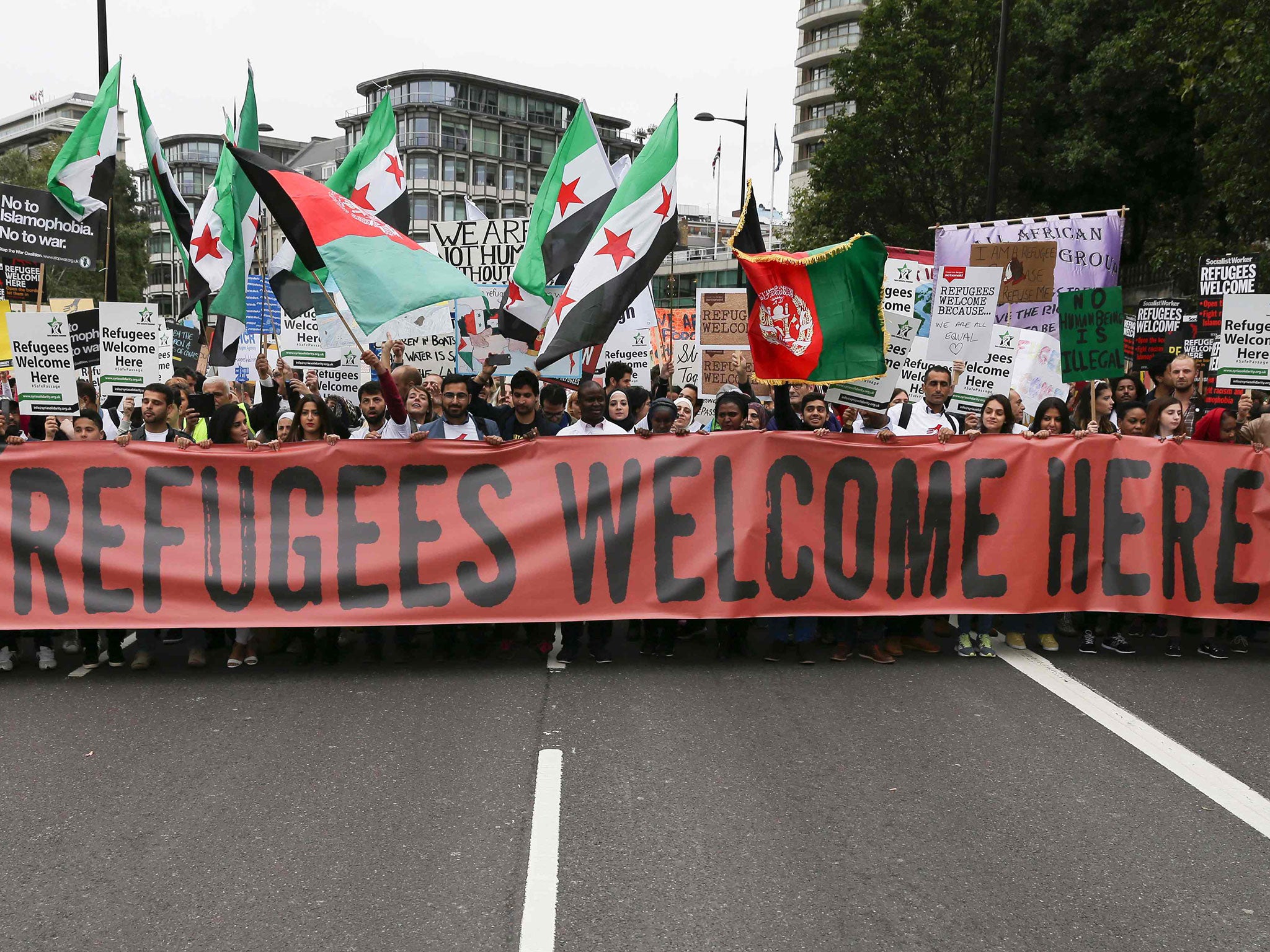 A march calling for the British Government to resettle more refugees in central London on September 17, 2016.