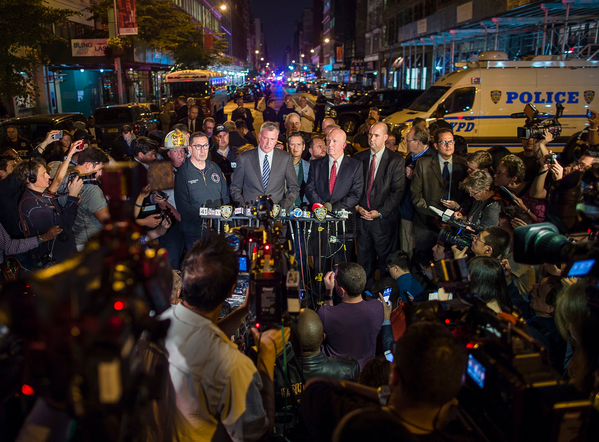 Mayor Bill de Blasio, center, and NYPD Chief of Department James O'Neill, center right, speak during a press conference near the scene