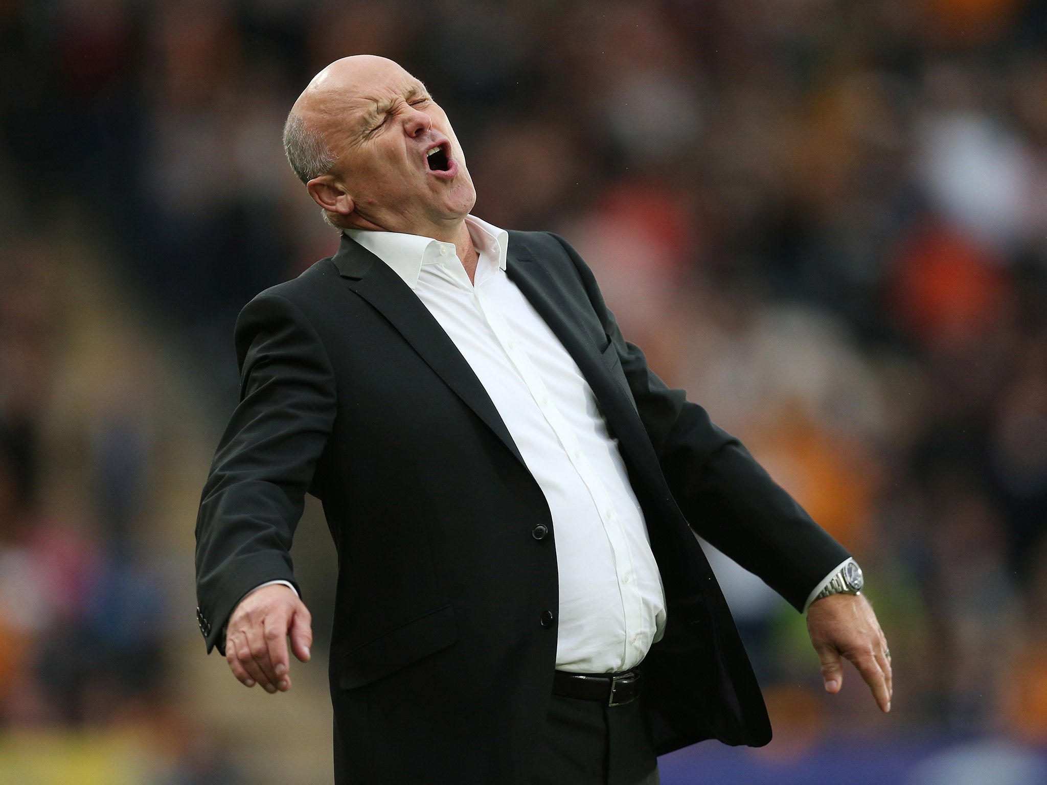 Phelan reacts during Hull's 4-1 defeat by Arsenal