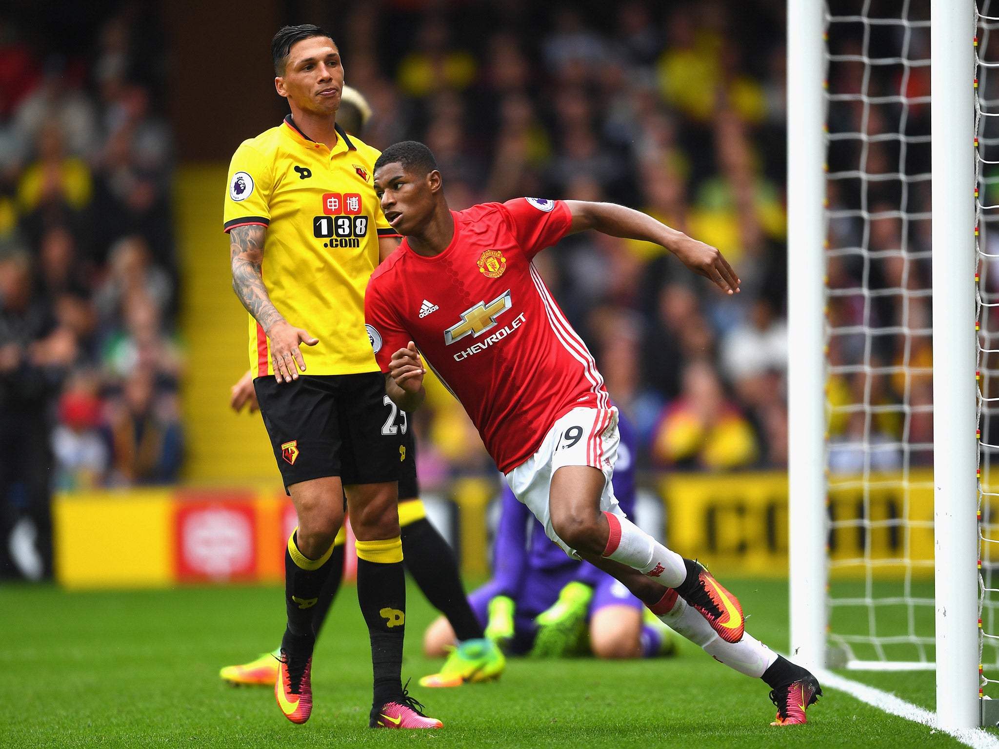 Marcus Rashford celebrates after scoring an equaliser for United