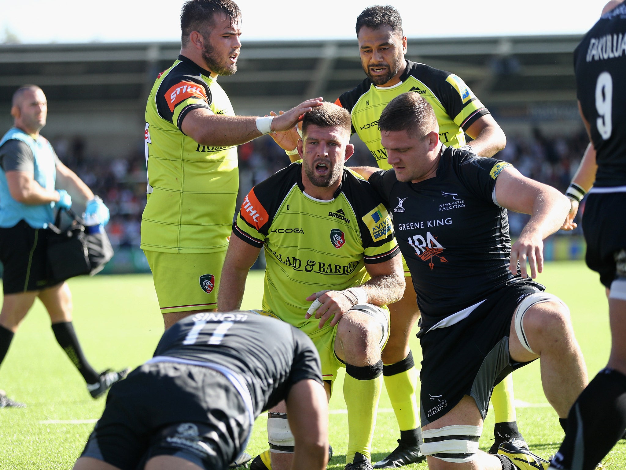 Leicester players celebrate after Mike Fitzgerald scores a try against Newcastle