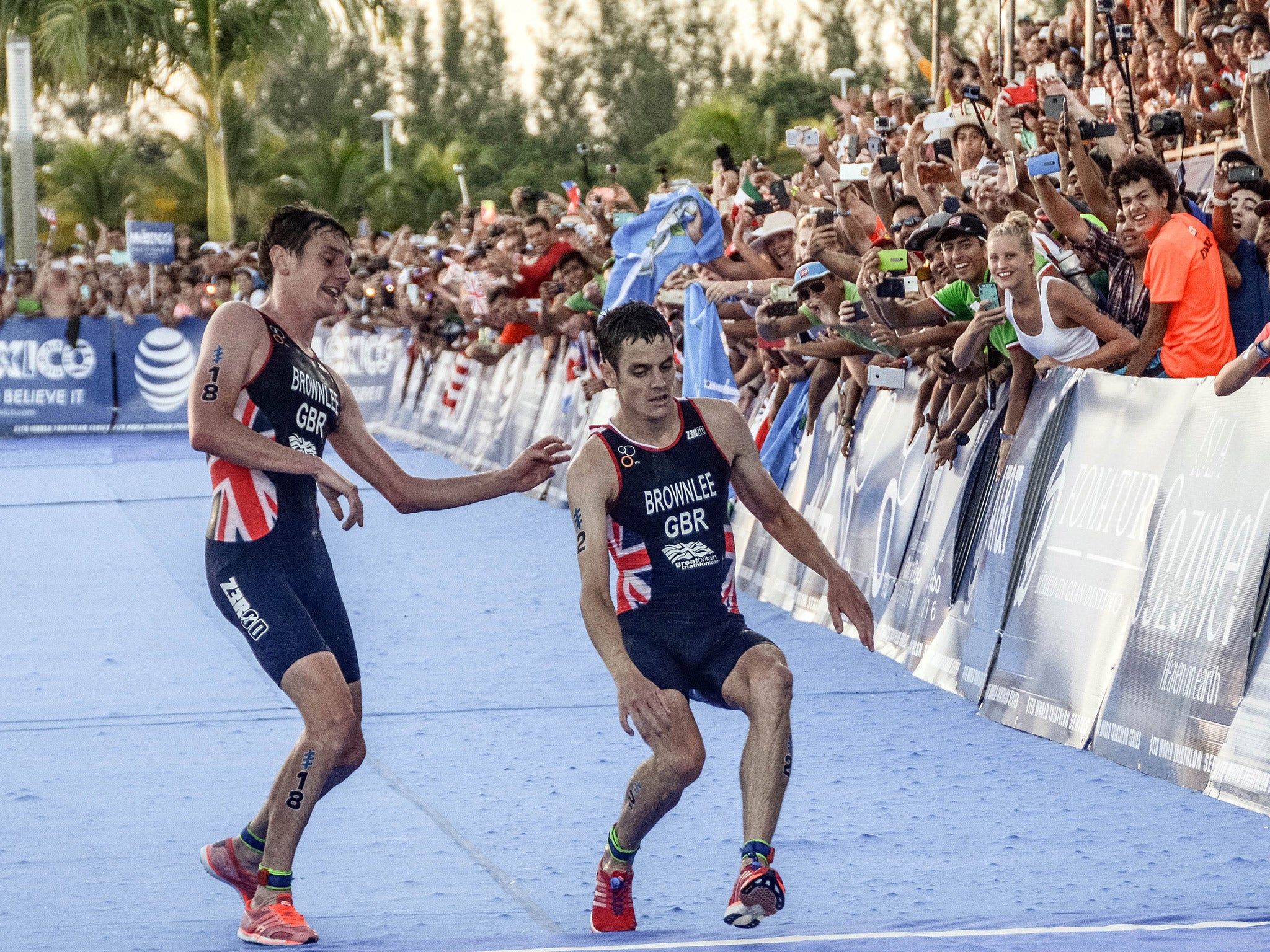 Jonny collapses as he reaches the finish line