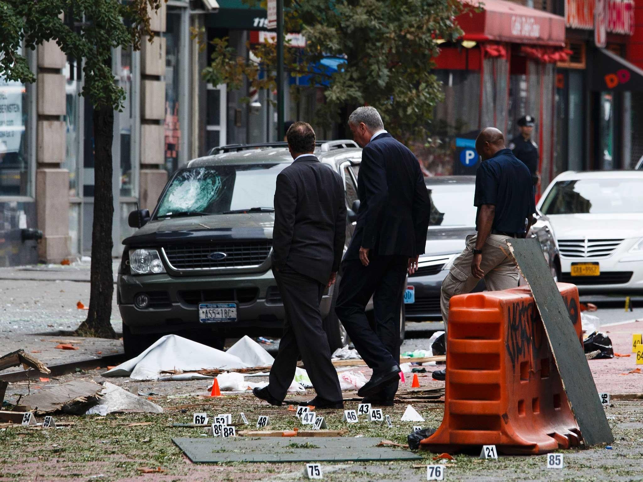 New York Mayor Bill de Blasio and Governor Andrew Cuomo tour the site of the explosion in Chelsea