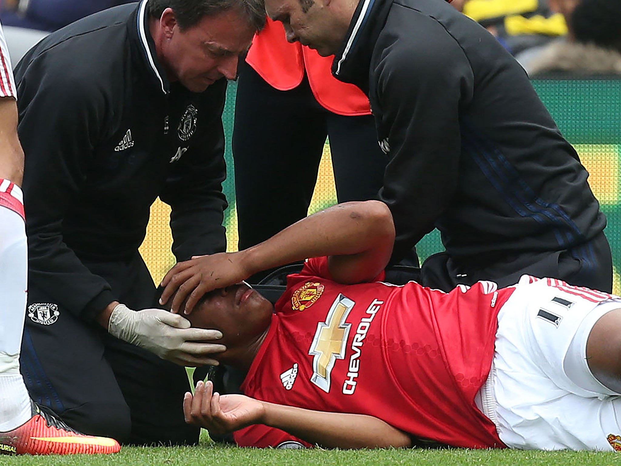 Martial appeared to be concussed after a clash of heads with Janmaat in the 27th minute