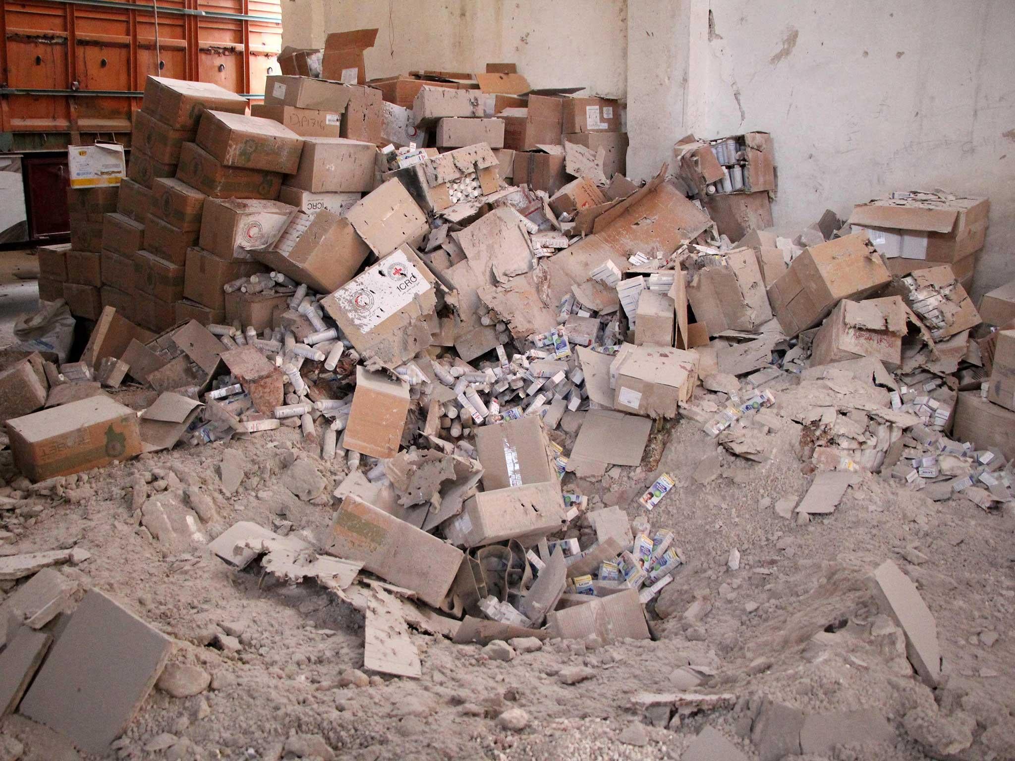 Damaged Red Cross and Arab Red Crescent medical supplies are seen in a warehouse in the town of Orum al-Kubra on the western outskirts of the northern Syrian city of Aleppo