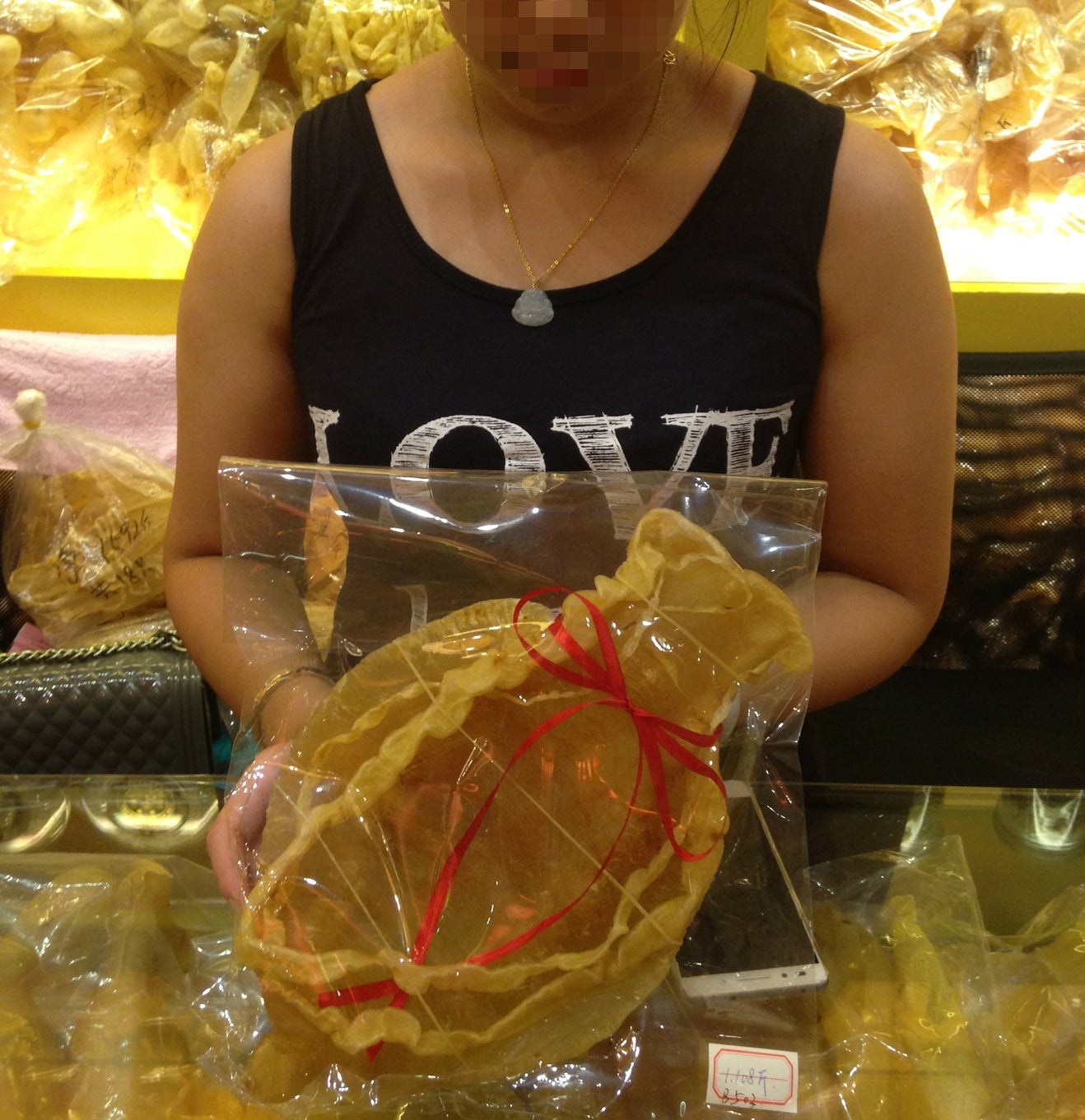 A Chinese trader shows EIA investigators a rare, totoaba fish maw