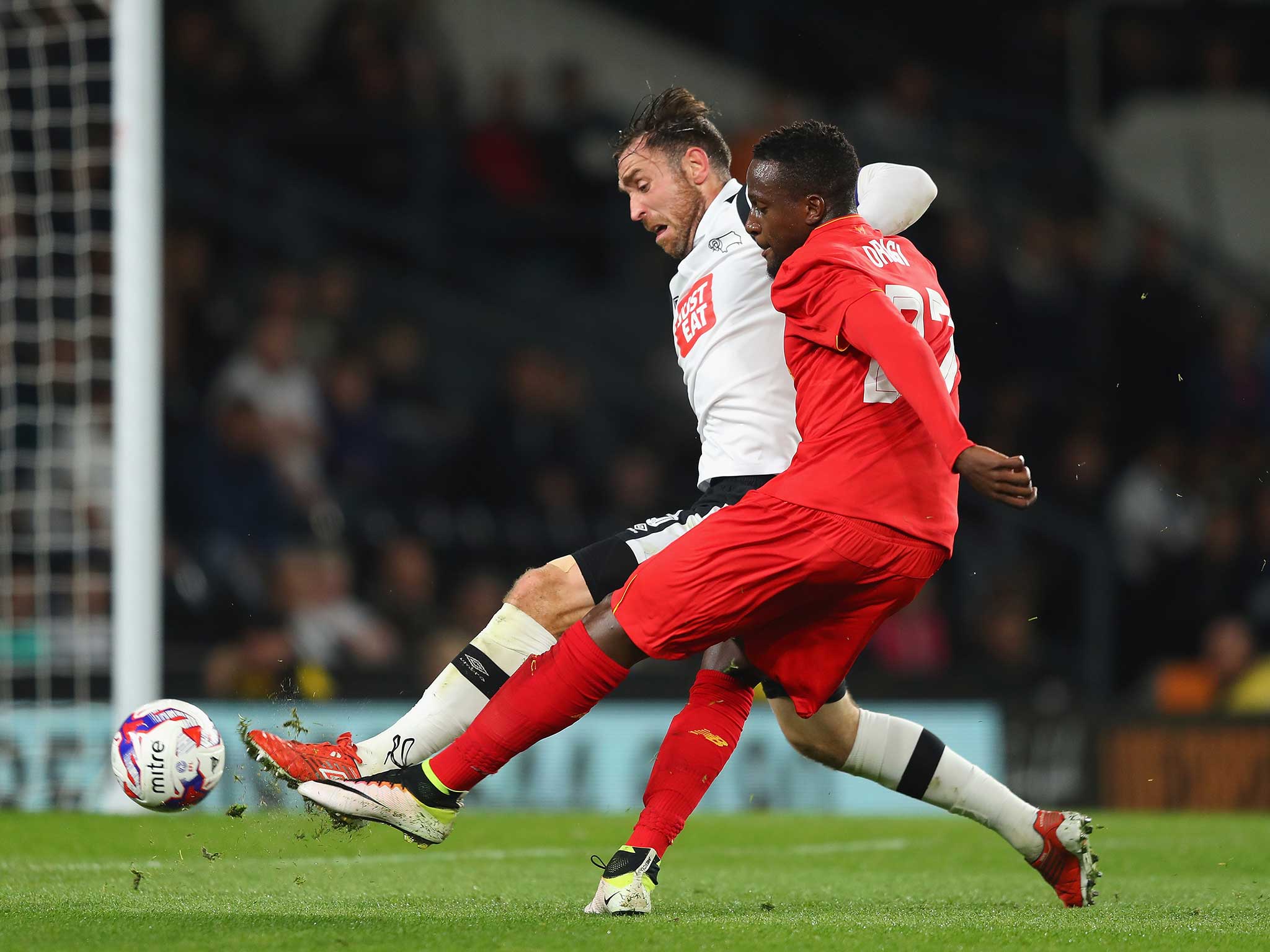 Divock Origi breaks past Richard Keogh to score at Derby