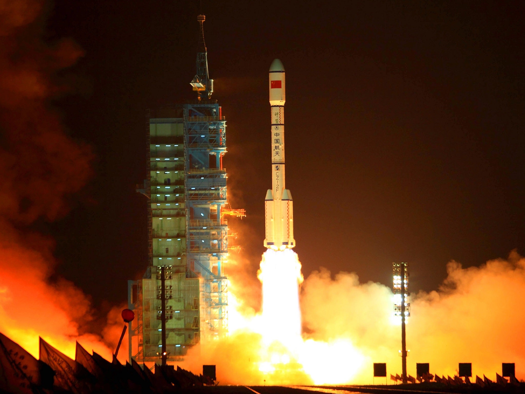 China's Long March 2F rocket carrying the Tiangong-1 module, or "Heavenly Palace", blasts off on September 29, 2011