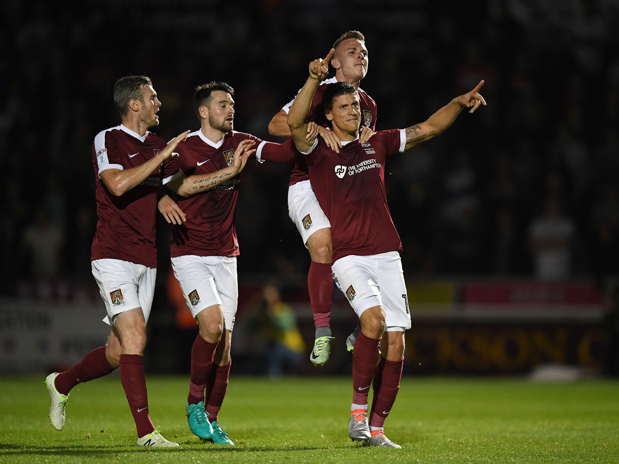 Alex Revell celebrates his penalty goal