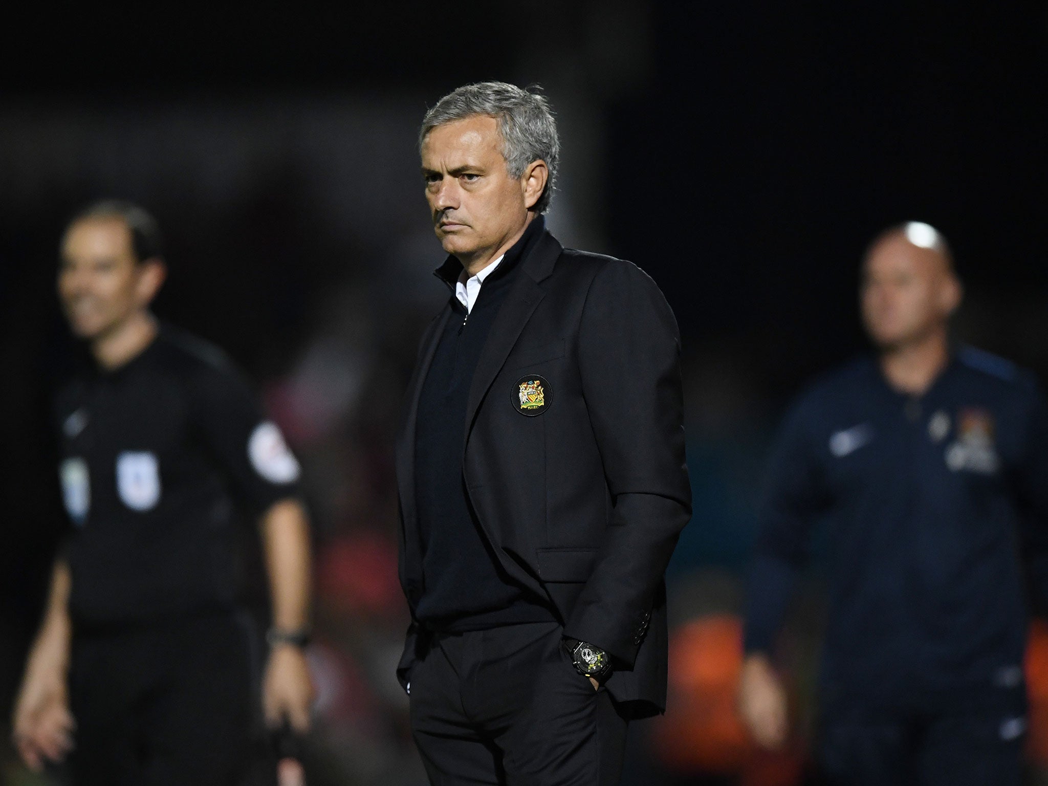 Jose Mourinho watches on from the side