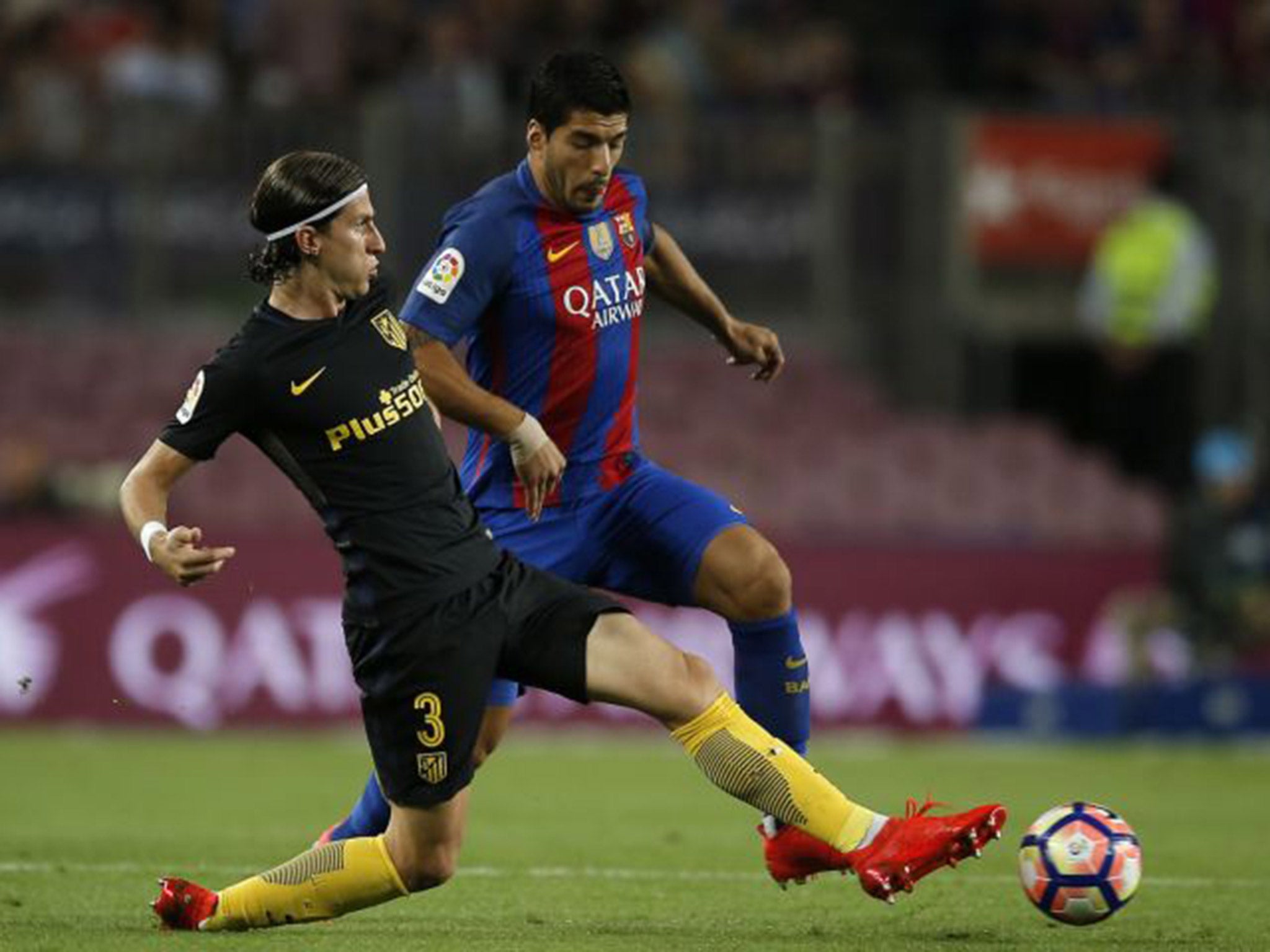 Luis Suarez's challenge on Filipe Luis left him with a hole in his foot