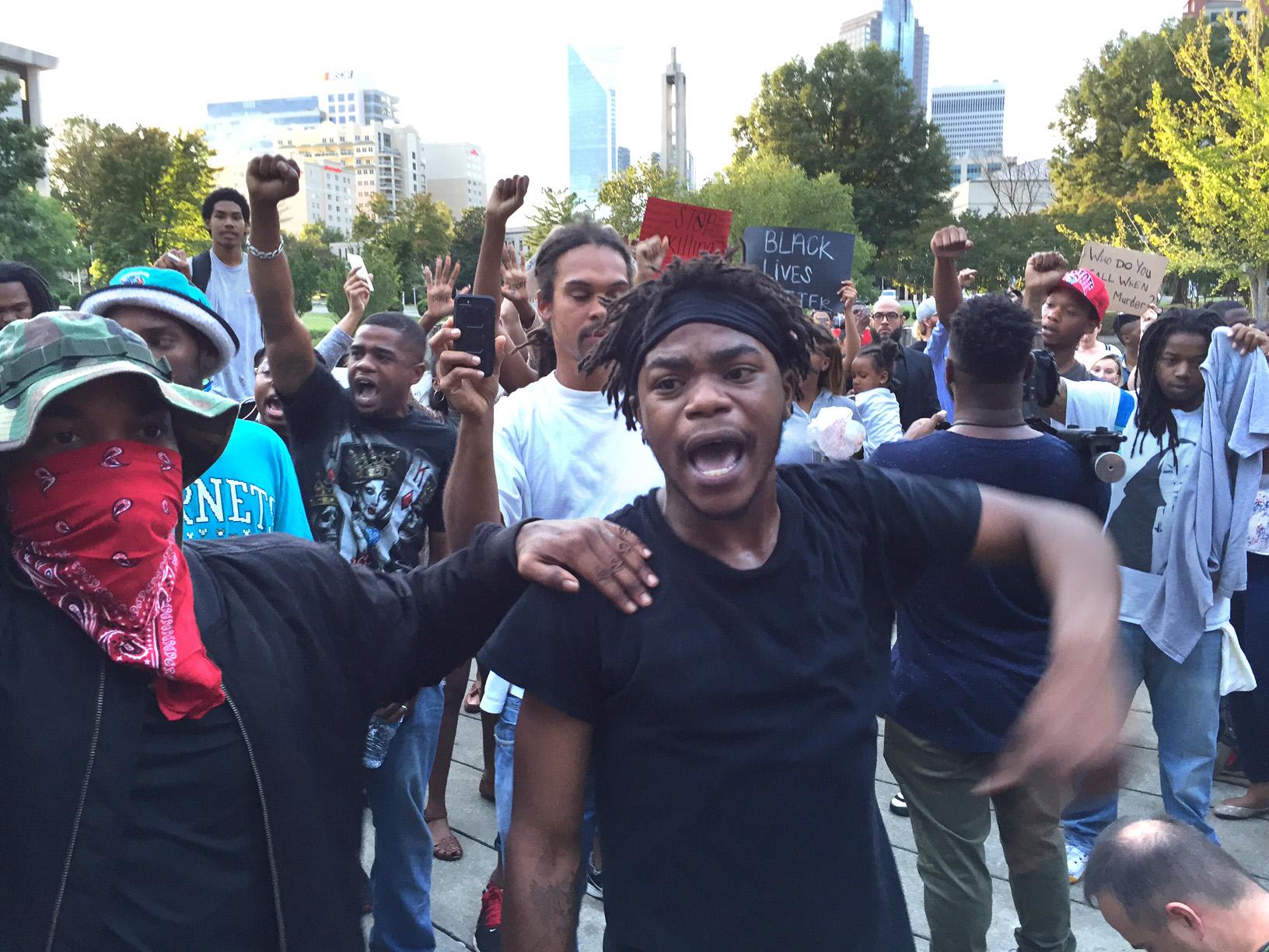 People gathering to protest Tuesday's deadly police shooting of a black man at Marshall Park in uptown Charlotte