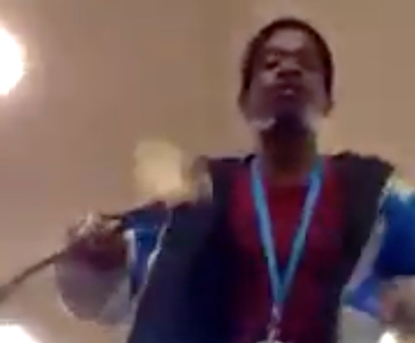 A video ends as Rhodes Must Fall activist Ntokozo Qwabe lunges towards the camera with a stick