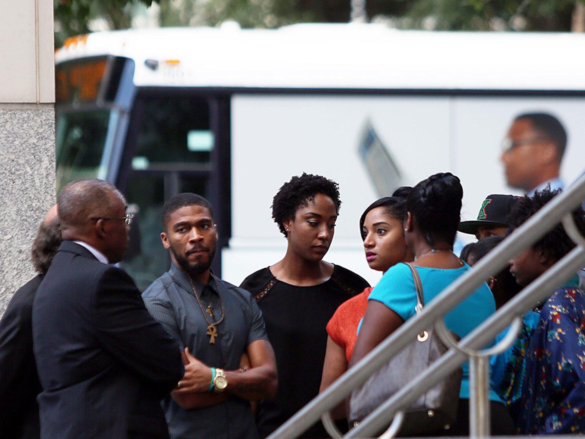 Members of Keith Lamont Scott's family gather outside the Mecklenburg County Courthouse