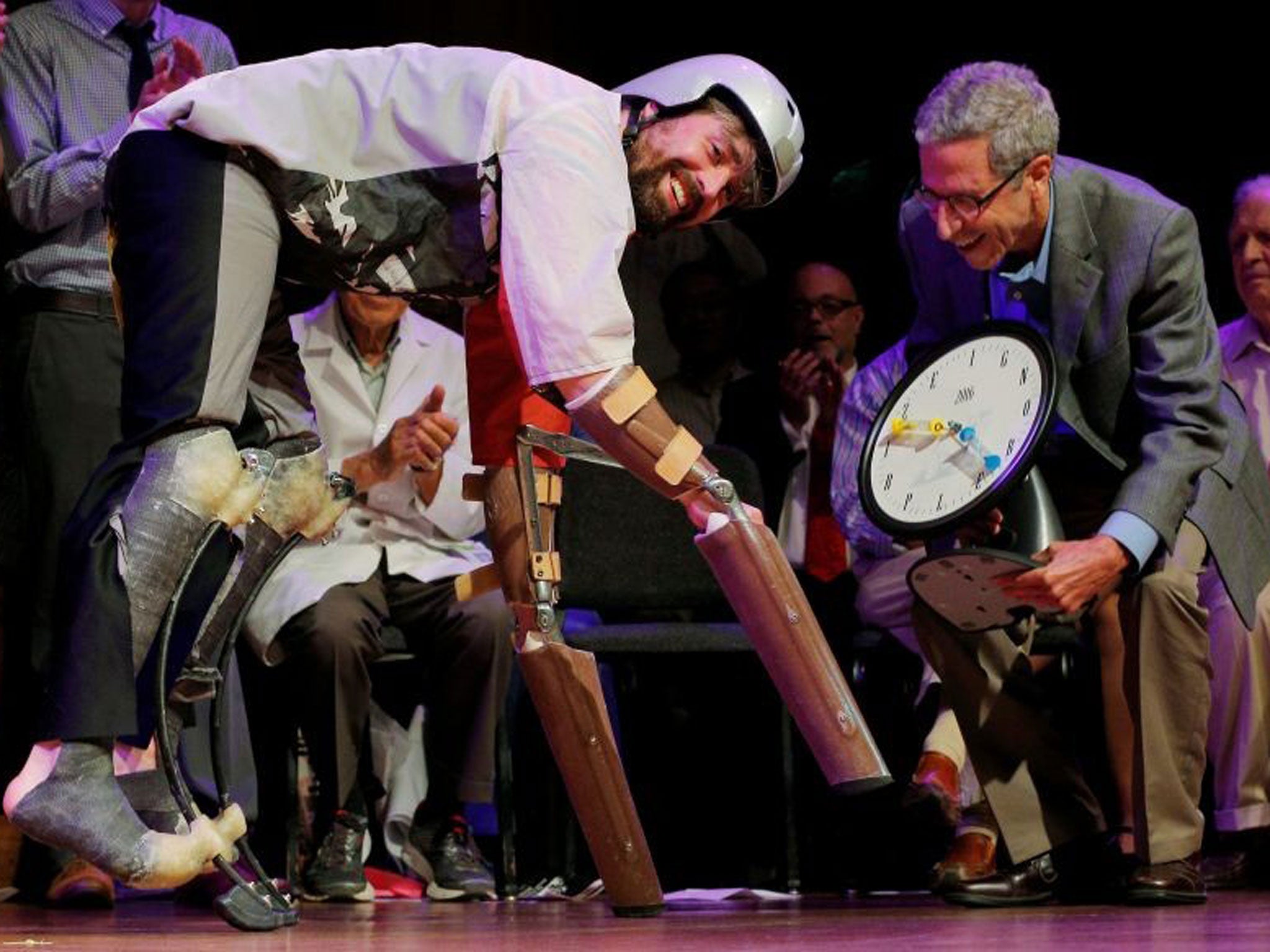 Nobel Laureate Eric Maskin presents the 2016 Ig Nobel Prize in Biology to Thomas Thwaites