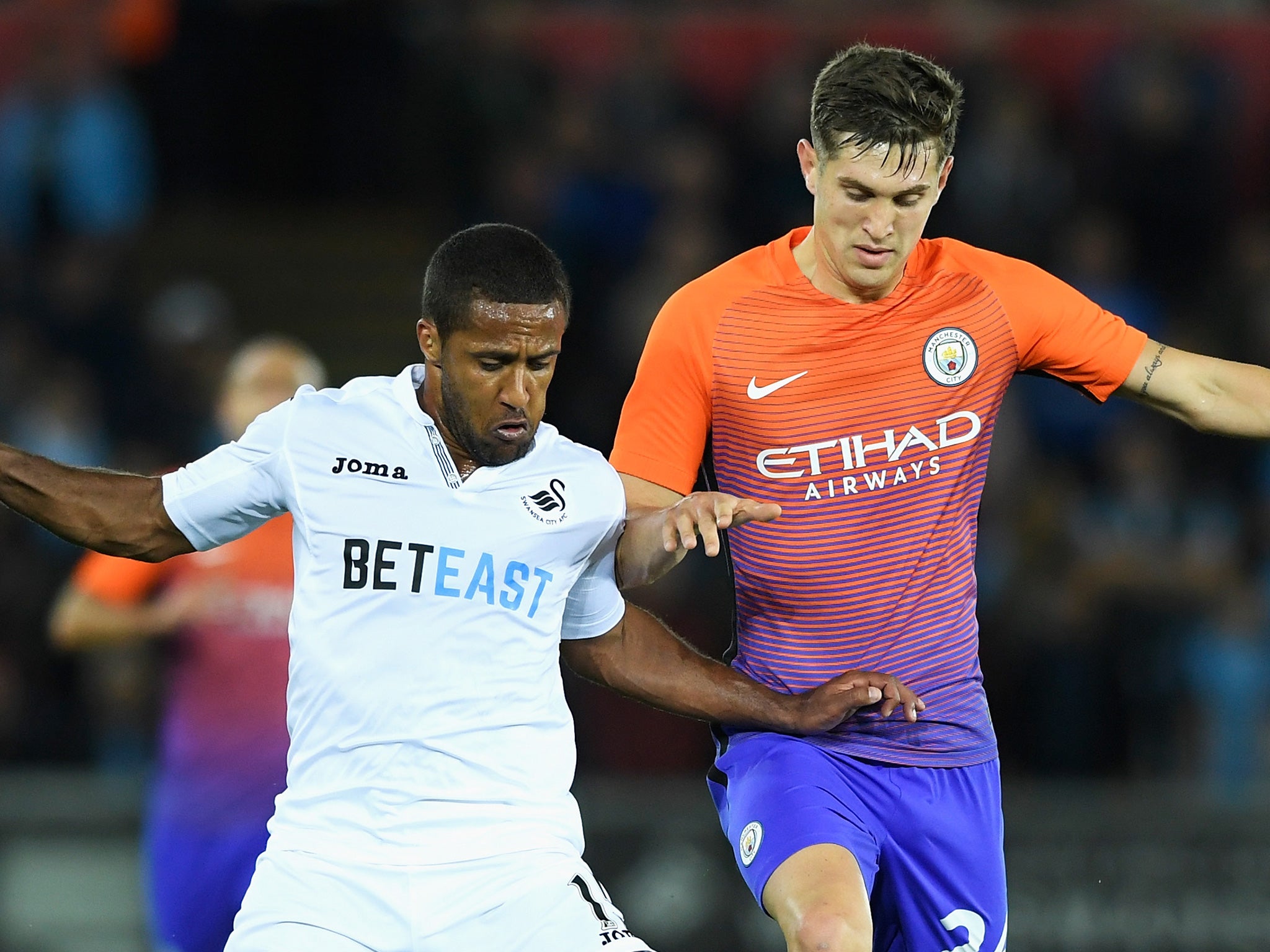 Routledge and Stones battle for the ball during Wednesday's EFL Cup tie