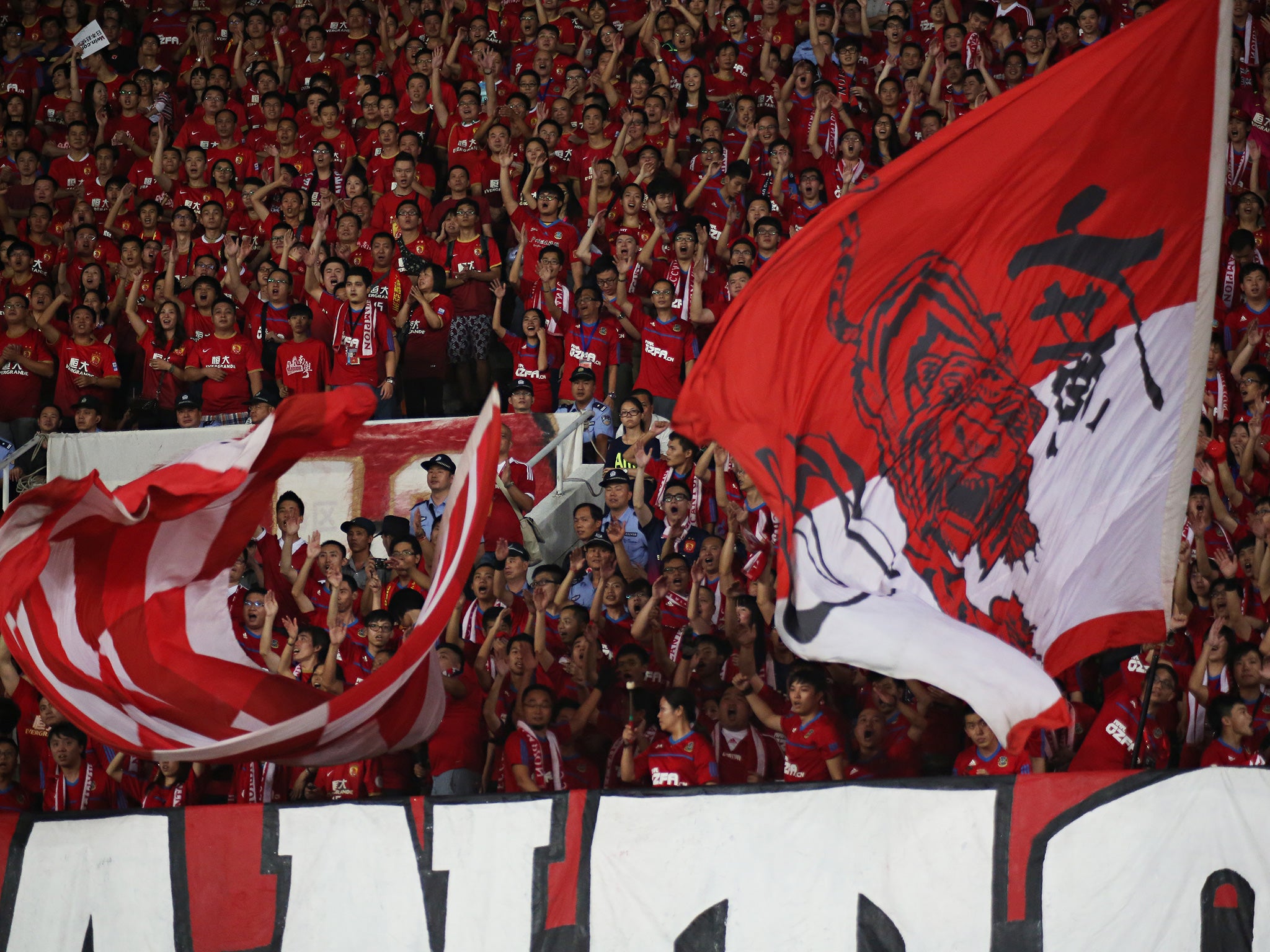 Guangzhou's noisy support packs out the Tianhe Stadium