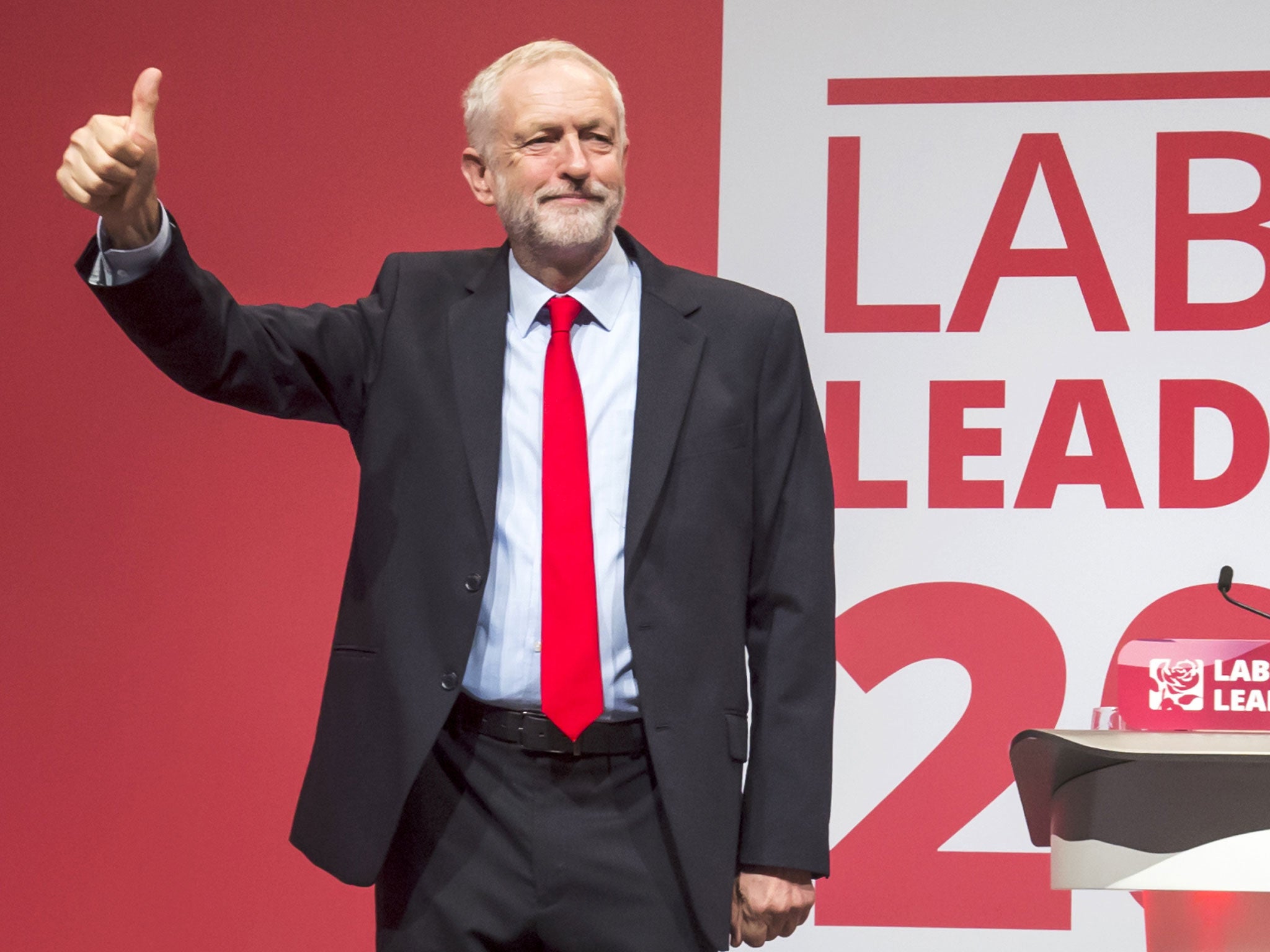 Jeremy Corbyn celebrates his victory following the announcement of the winner in the Labour leadership contest