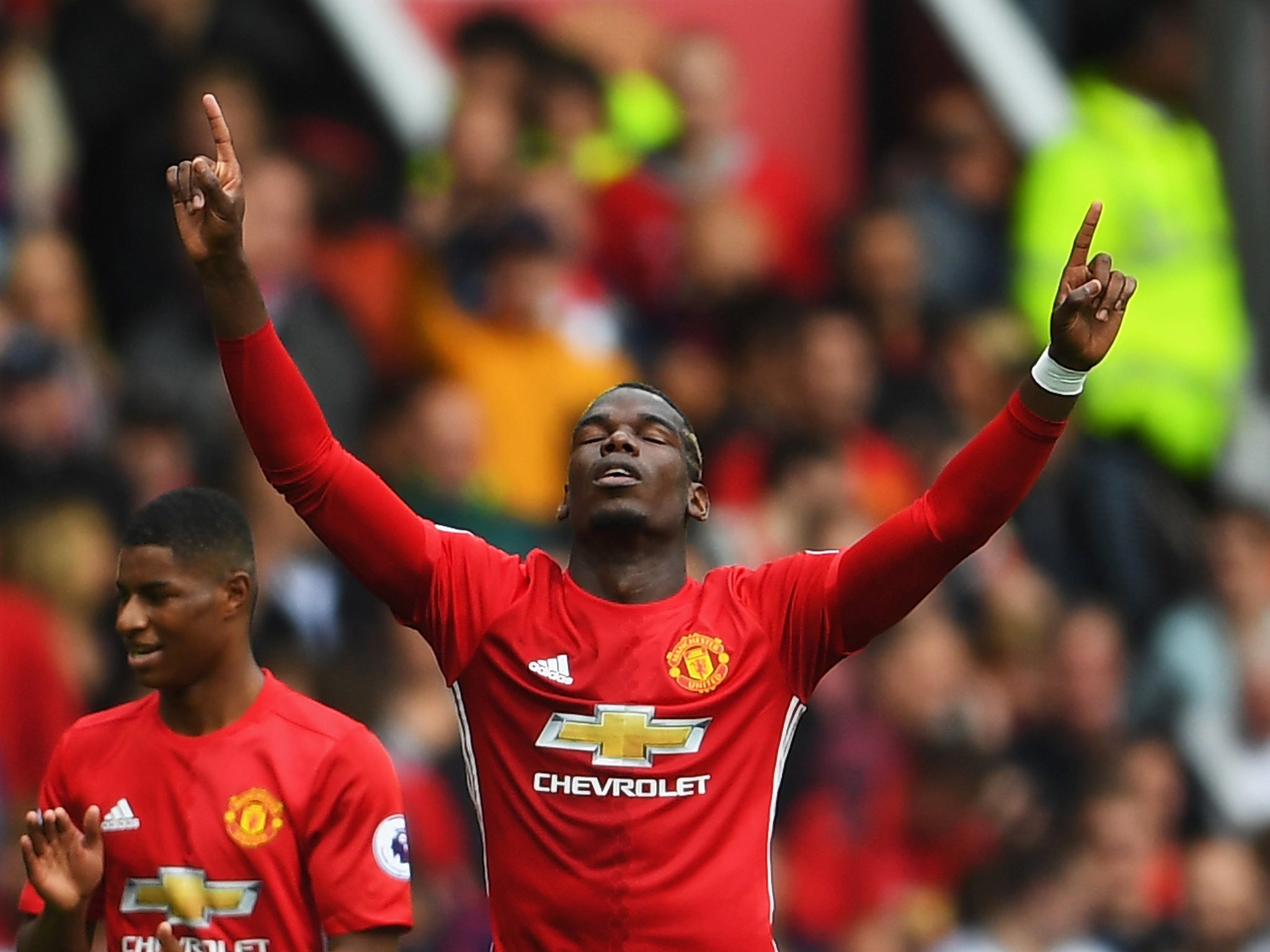 Pogba celebrates his first goal for United