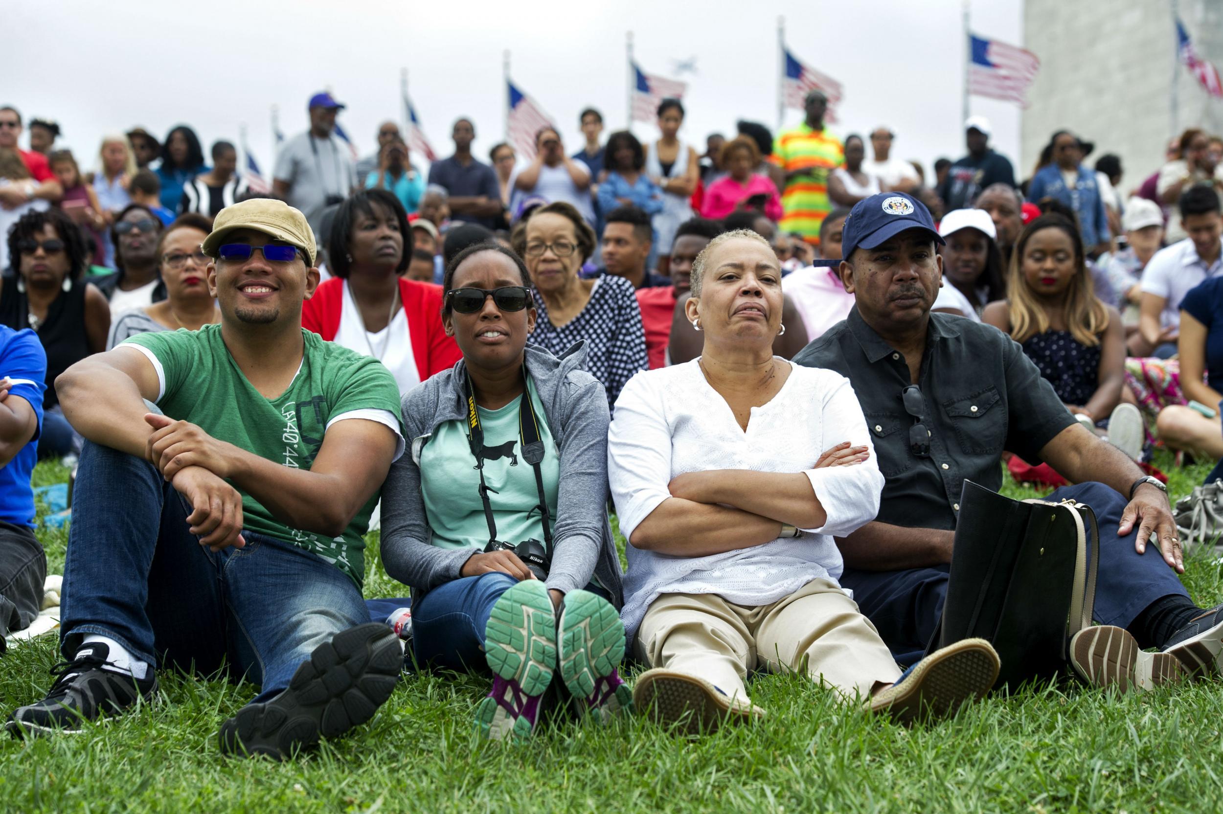 Former president George W Bush also attended the event in Washington, which drew large crowds