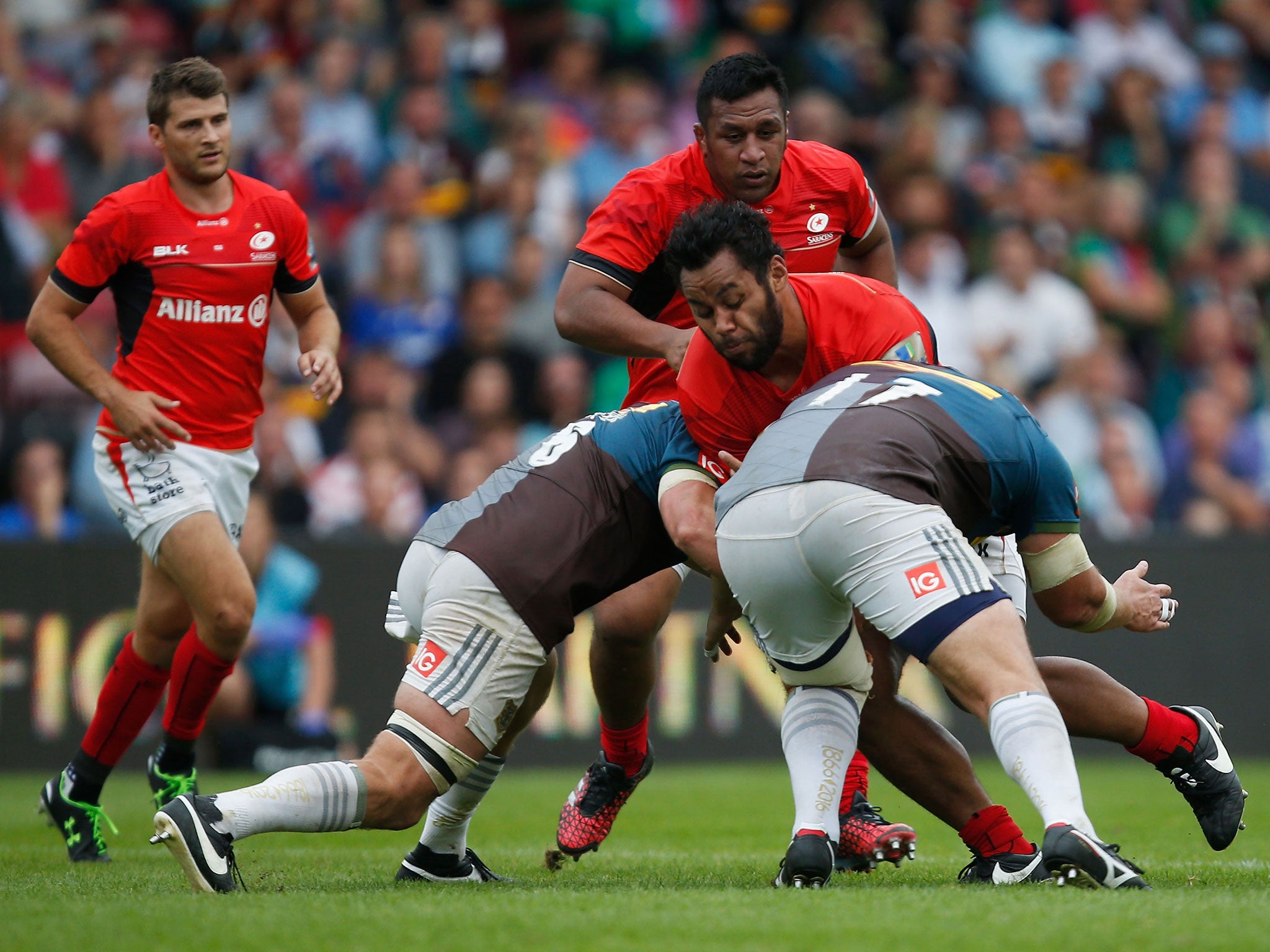 Billy Vunipola is stopped in his tracks by the Harlequins defence