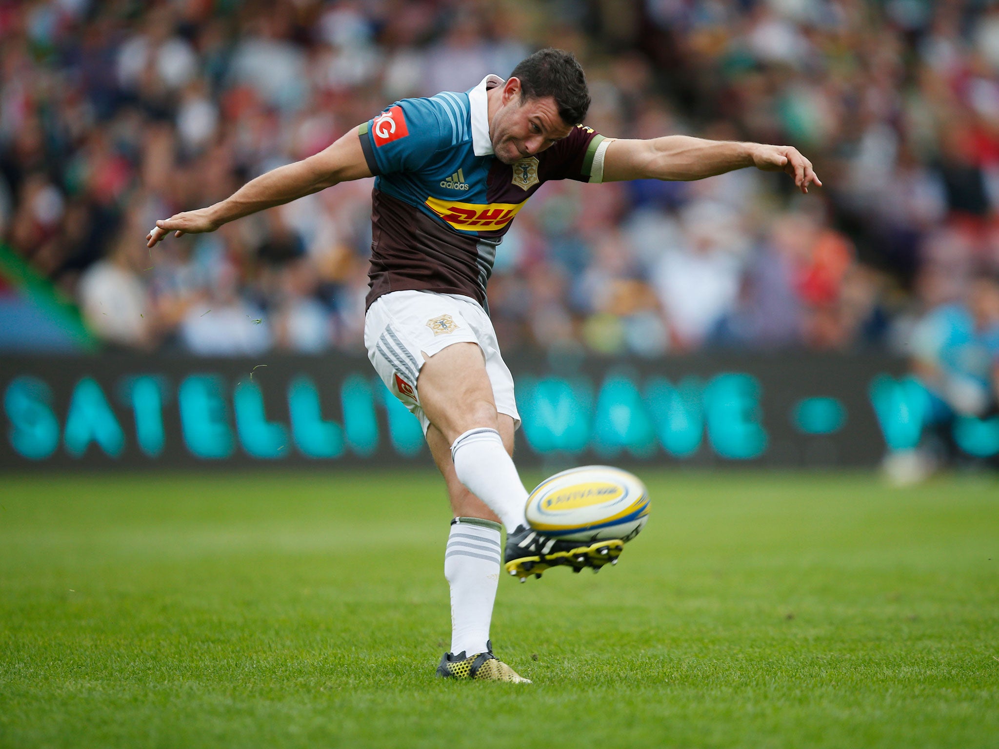 Karl Dickson of Harlequins kicks for touch