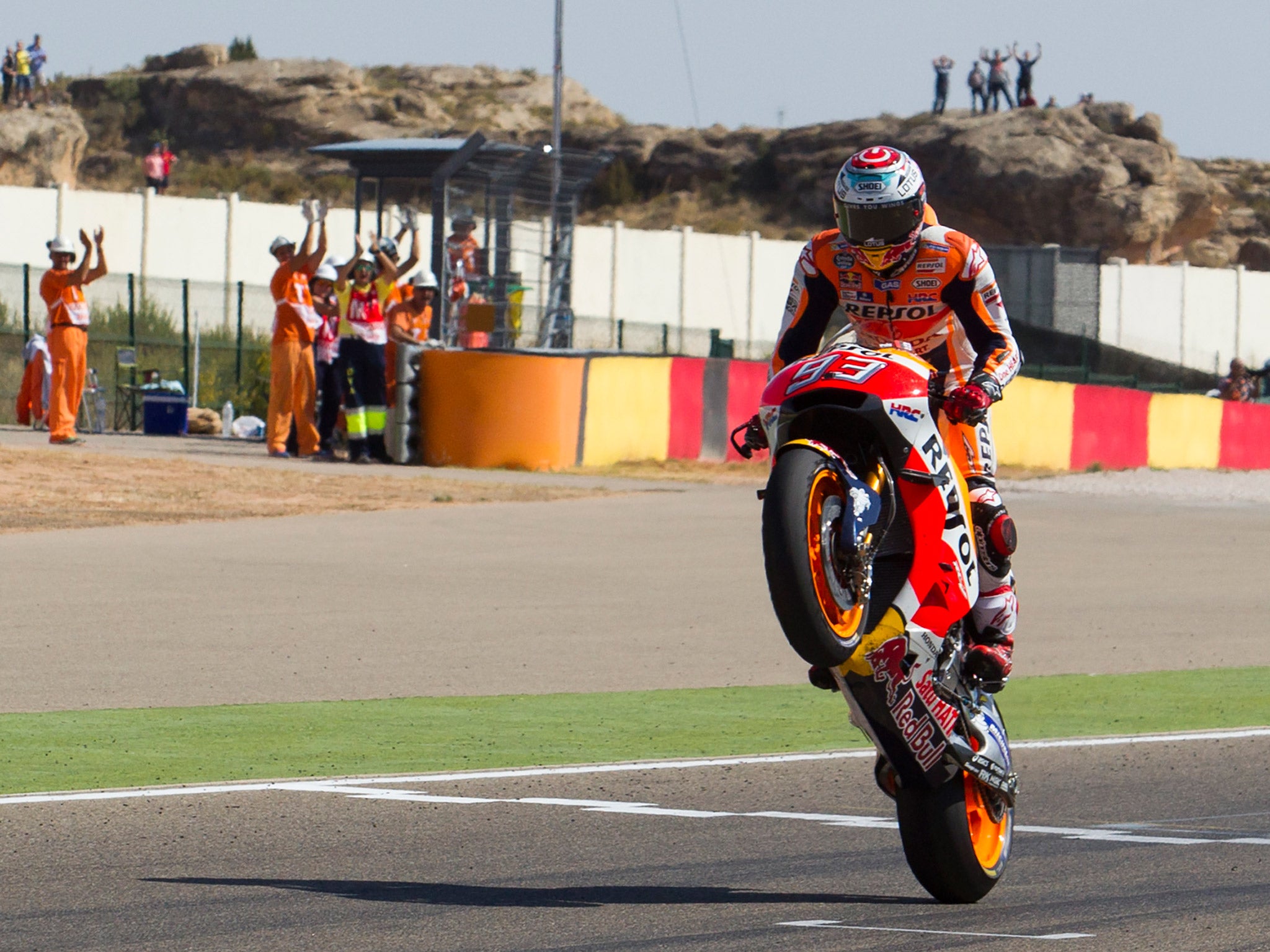 Marc Marquez wheelies over the finish line in Aragon to won the Spanish Grand Prix