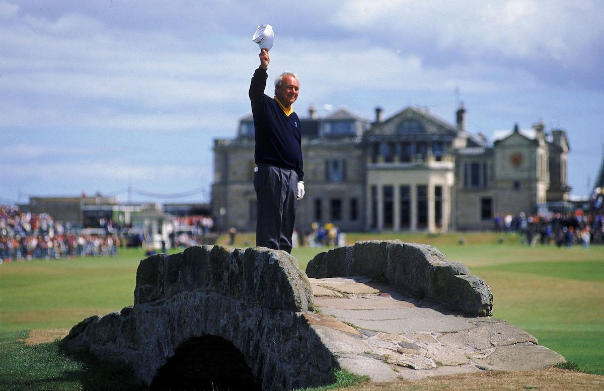 Arnold Palmer waves farewell after his final appearance at the Open at St Andrews in 1995