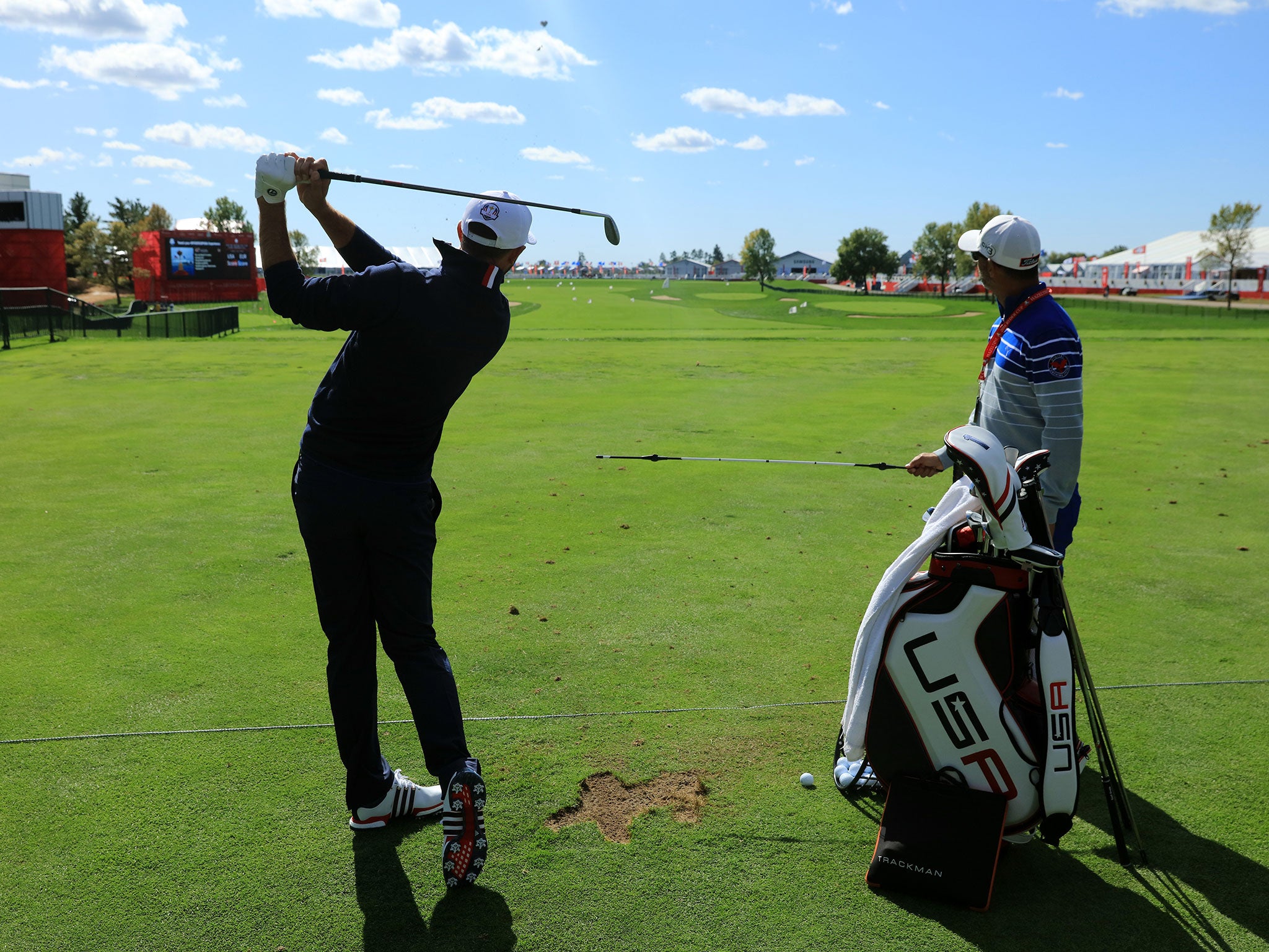 Dustin Johnson gets some practice in ahead of Friday's tee-off